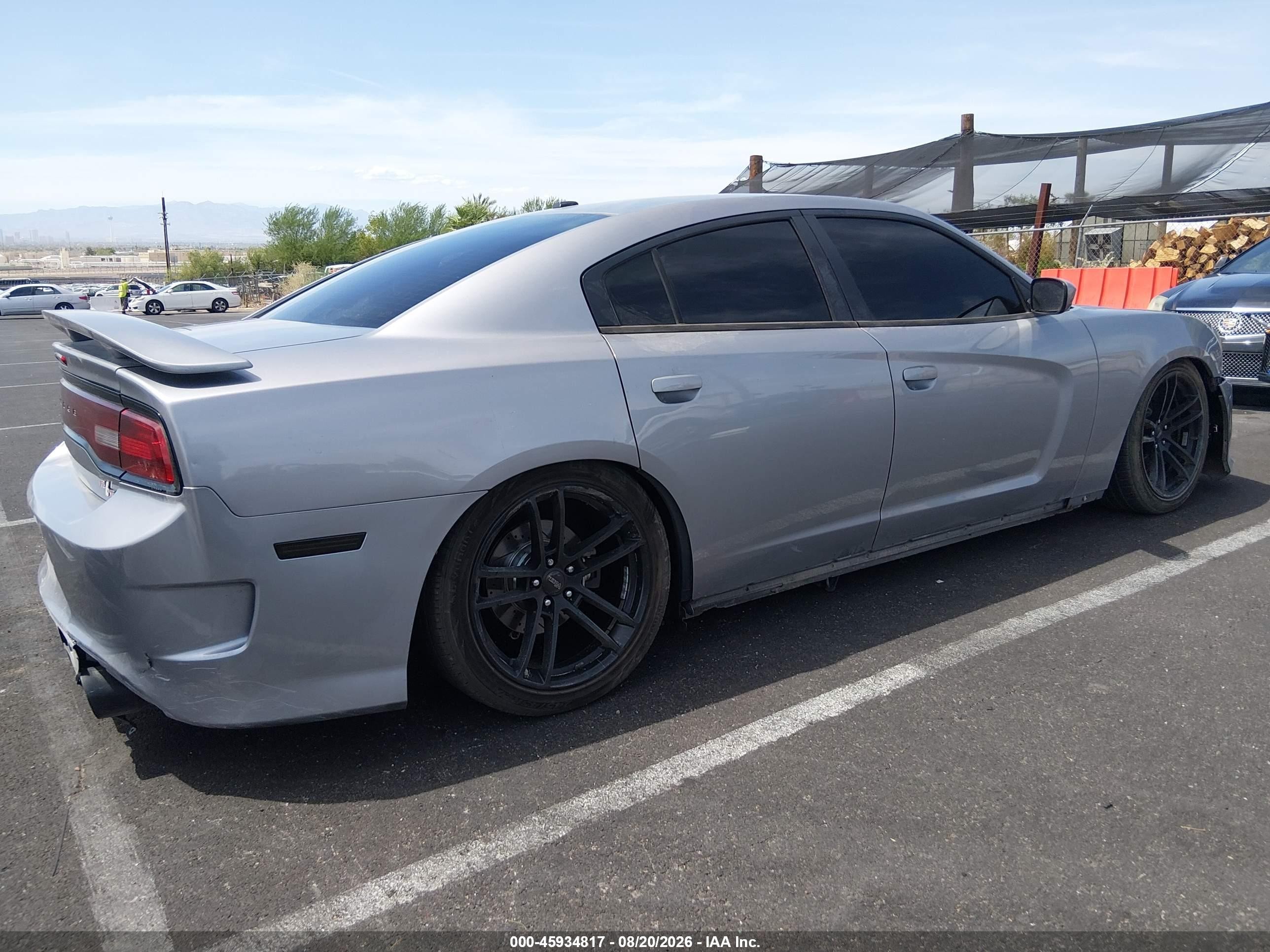 2013 Dodge Charger VIN 2C3CDXCT6DH683747 IAAI salvage auction — Side, Salvage (Nevada), sold $1,800 on 2026-10-09 (photo 4)