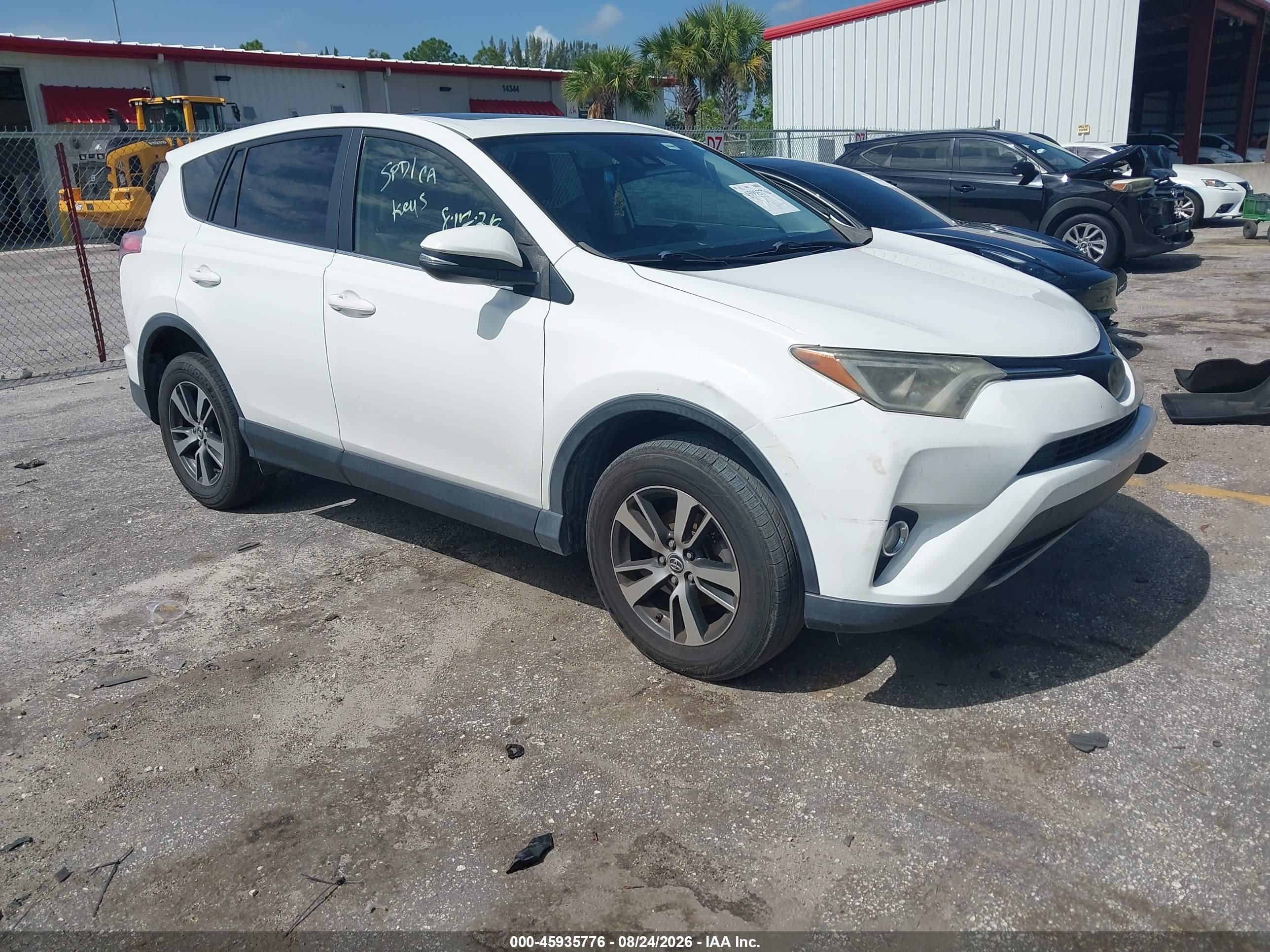 2018 Toyota RAV4 VIN JTMWFREV2JJ724009 — IAAI salvage auction photo