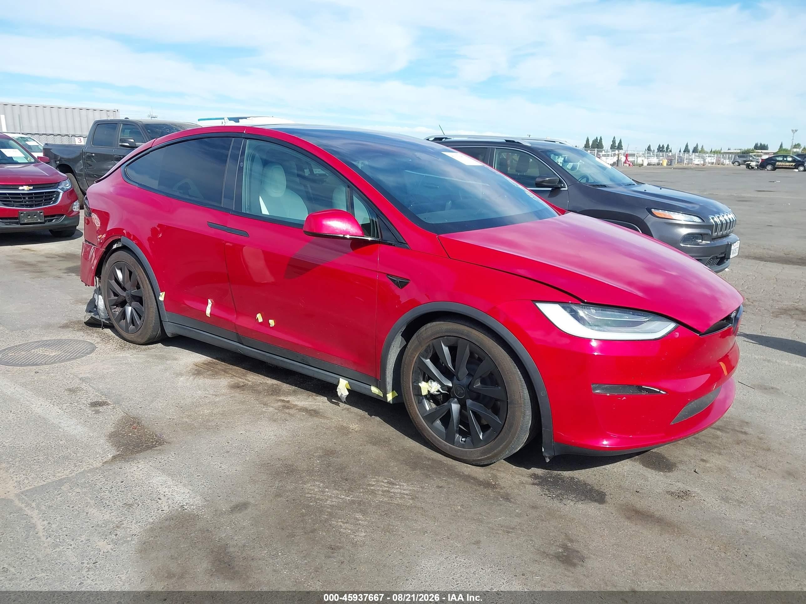 2023 Tesla Model X VIN 7SAXCAE51PF380223 — IAAI salvage auction photo