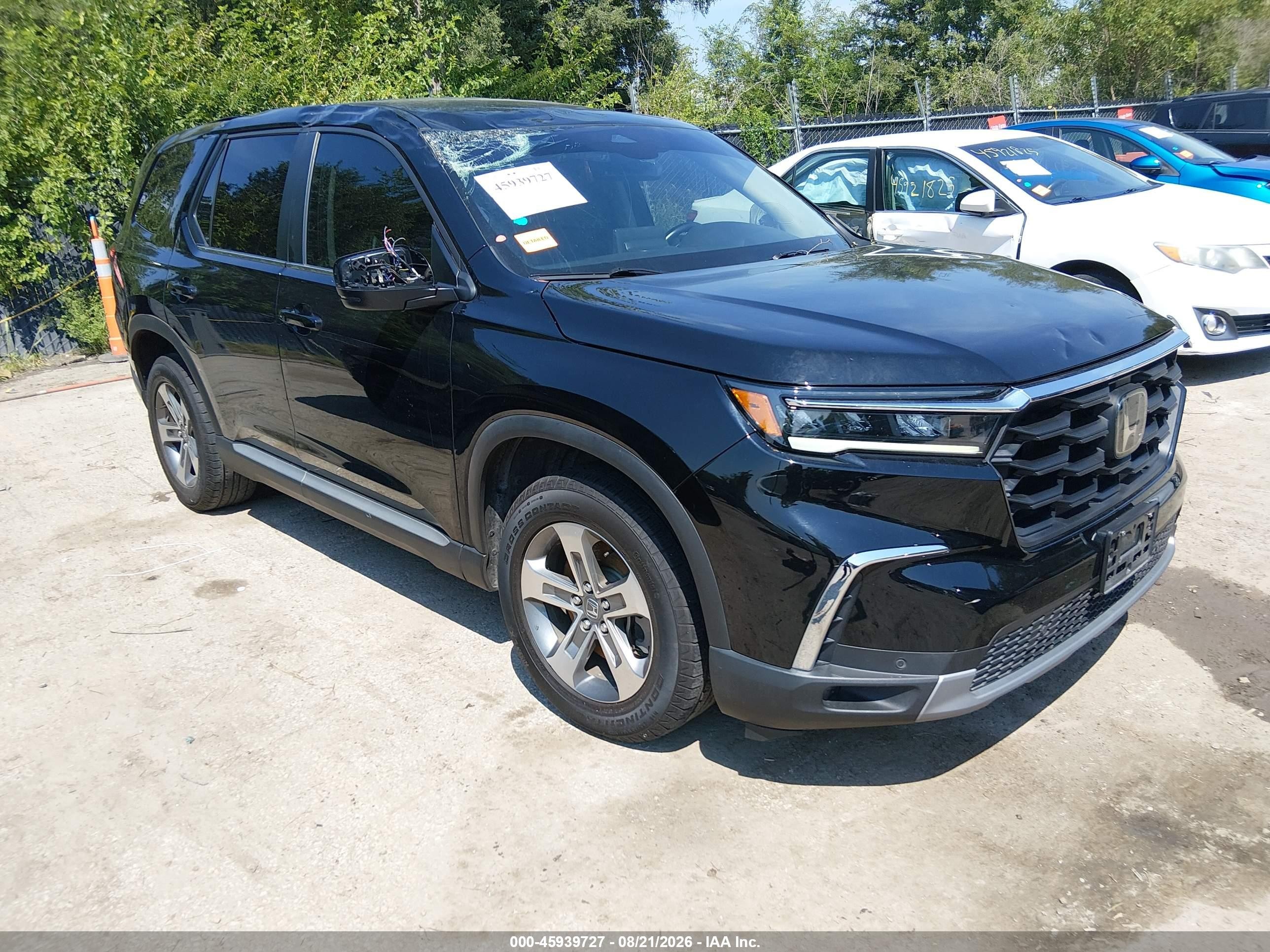 2023 Honda Pilot VIN 5FNYG1H46PB013522 — IAAI salvage auction photo