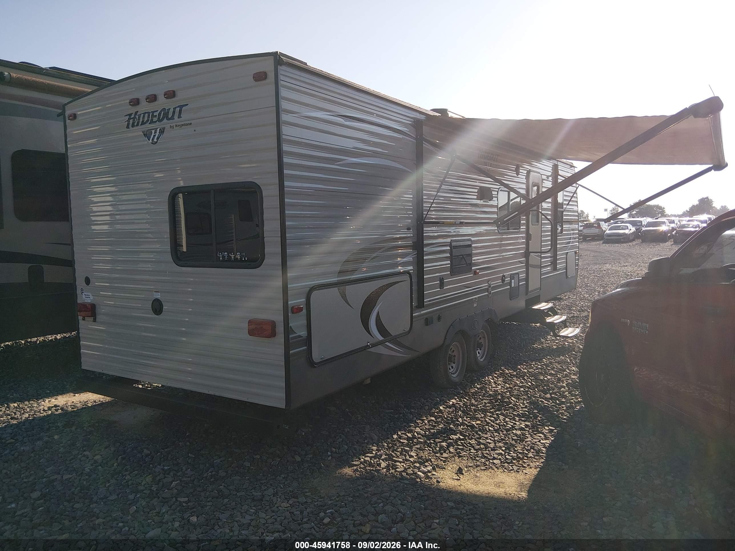 2016 Keystone Hideout VIN 4YDT27D22G7206950 IAAI salvage auction — Side, Salvage (West Virginia), sold $3,200 on 2026-09-30 (photo 4)