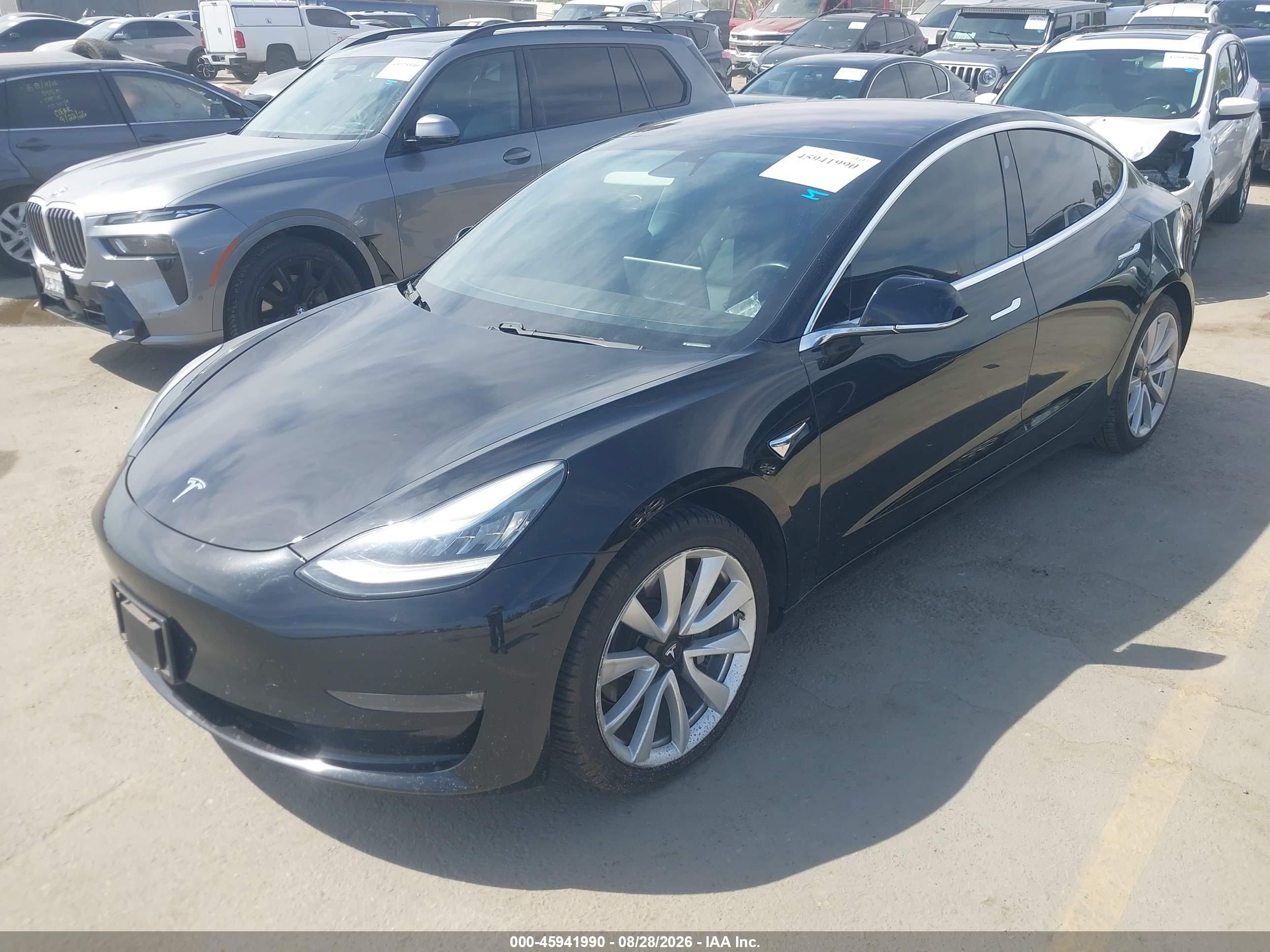 2018 Tesla Model 3 VIN 5YJ3E1EA1JF075850 IAAI salvage auction — Rear End, Salvage (California), sold $5,800 on 2026-09-23 (photo 2)