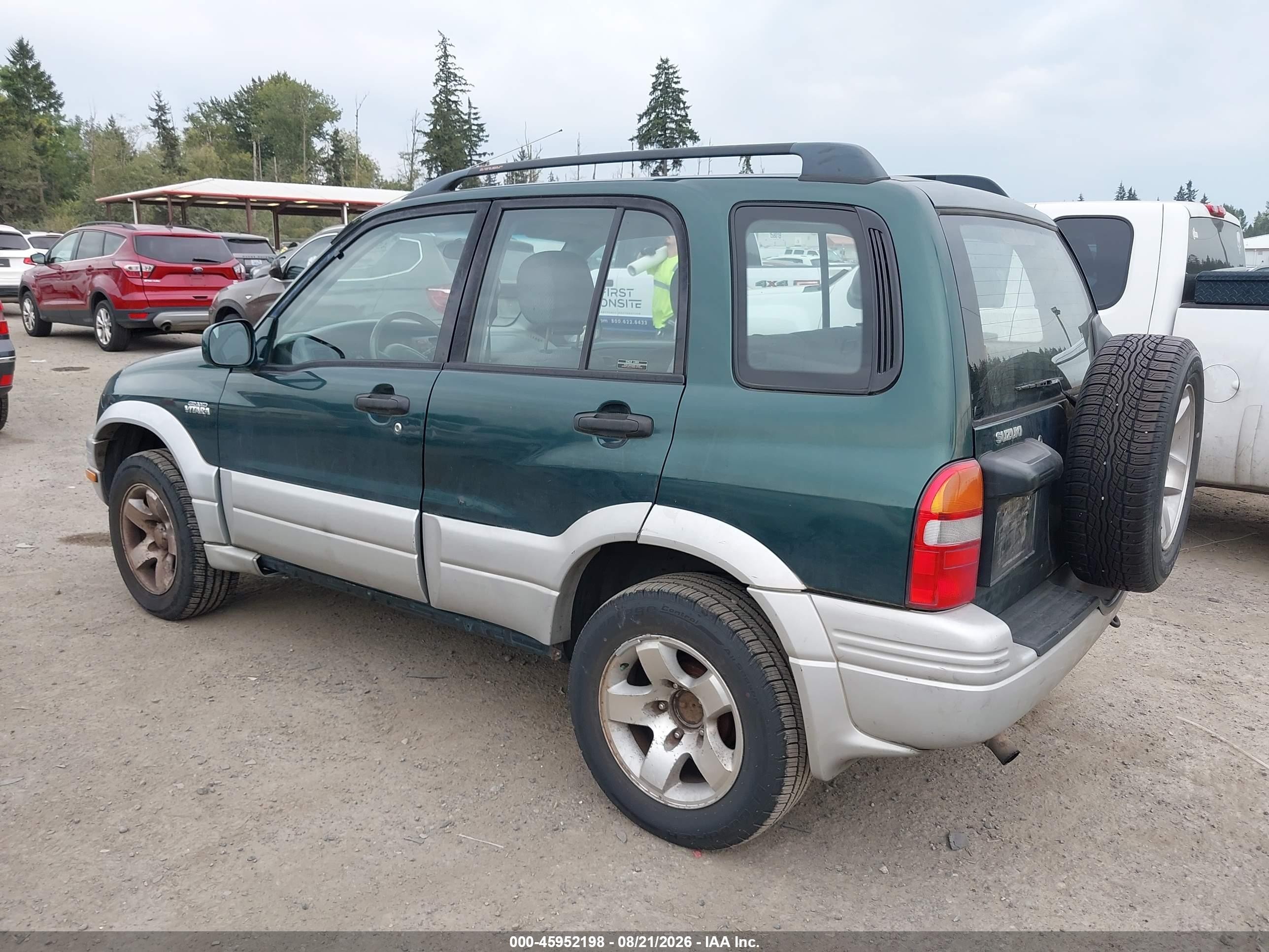 1999 Suzuki Grand vitara VIN JS3TD62V3X4117878 IAAI salvage auction — Normal Wear, Clear (Washington), sold $325 on 2026-09-02 (photo 3)