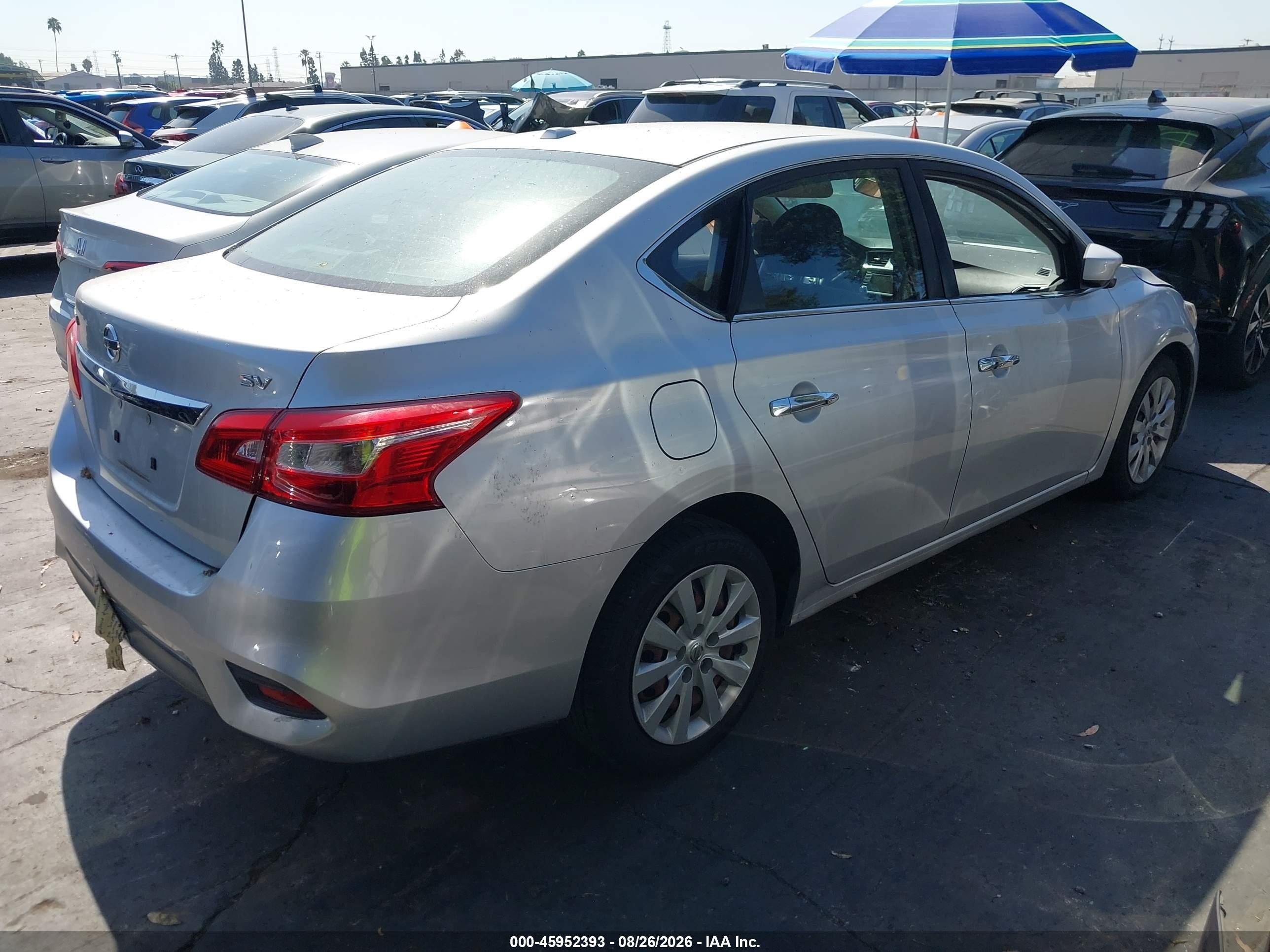 2017 Nissan Sentra VIN 3N1AB7APXHY348248 IAAI salvage auction — Side, Salvage Certificate (California), sold $650 on 2026-09-13 (photo 4)