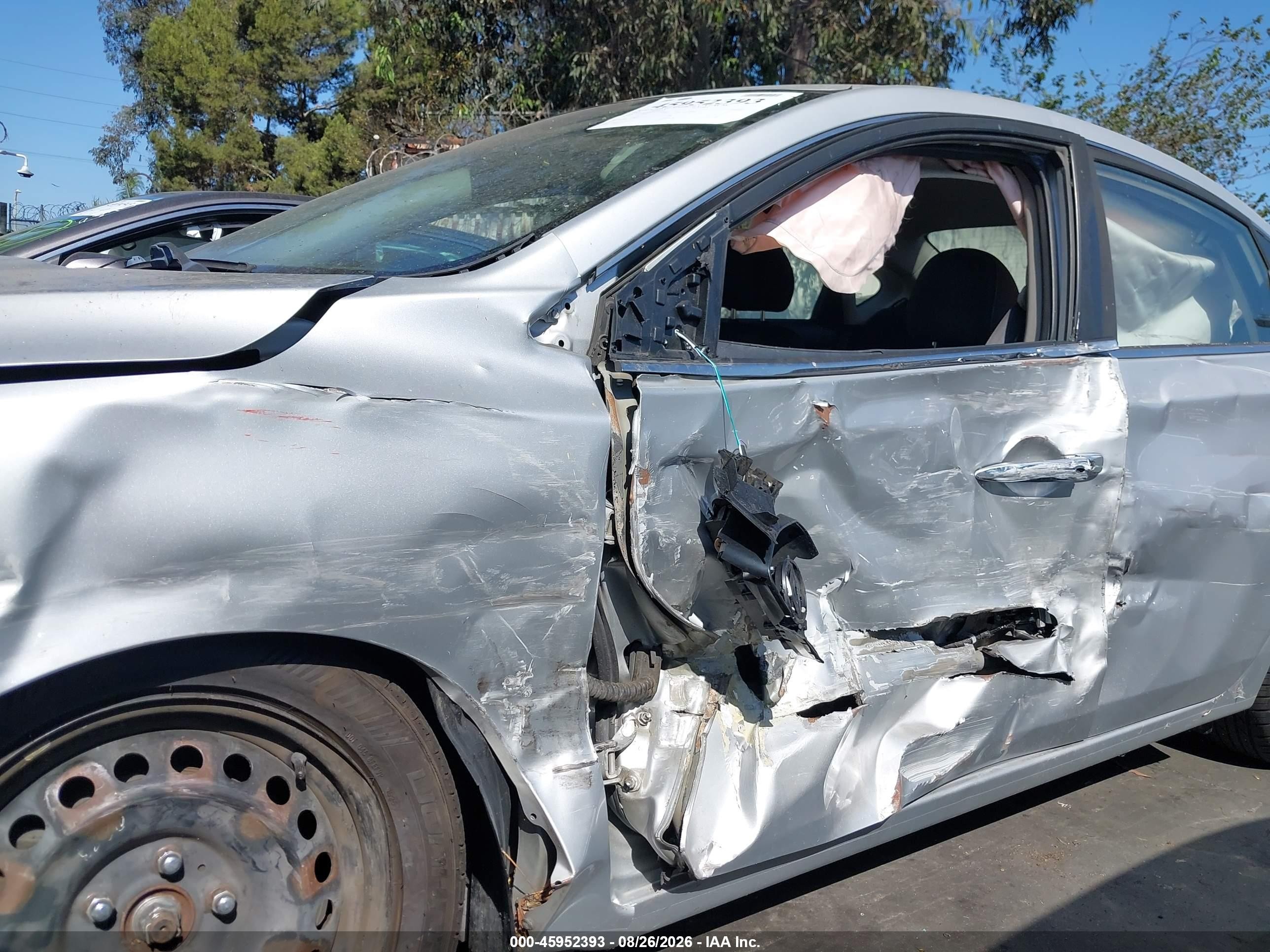 2017 Nissan Sentra VIN 3N1AB7APXHY348248 IAAI salvage auction — Side, Salvage Certificate (California), sold $650 on 2026-09-13 (photo 6)