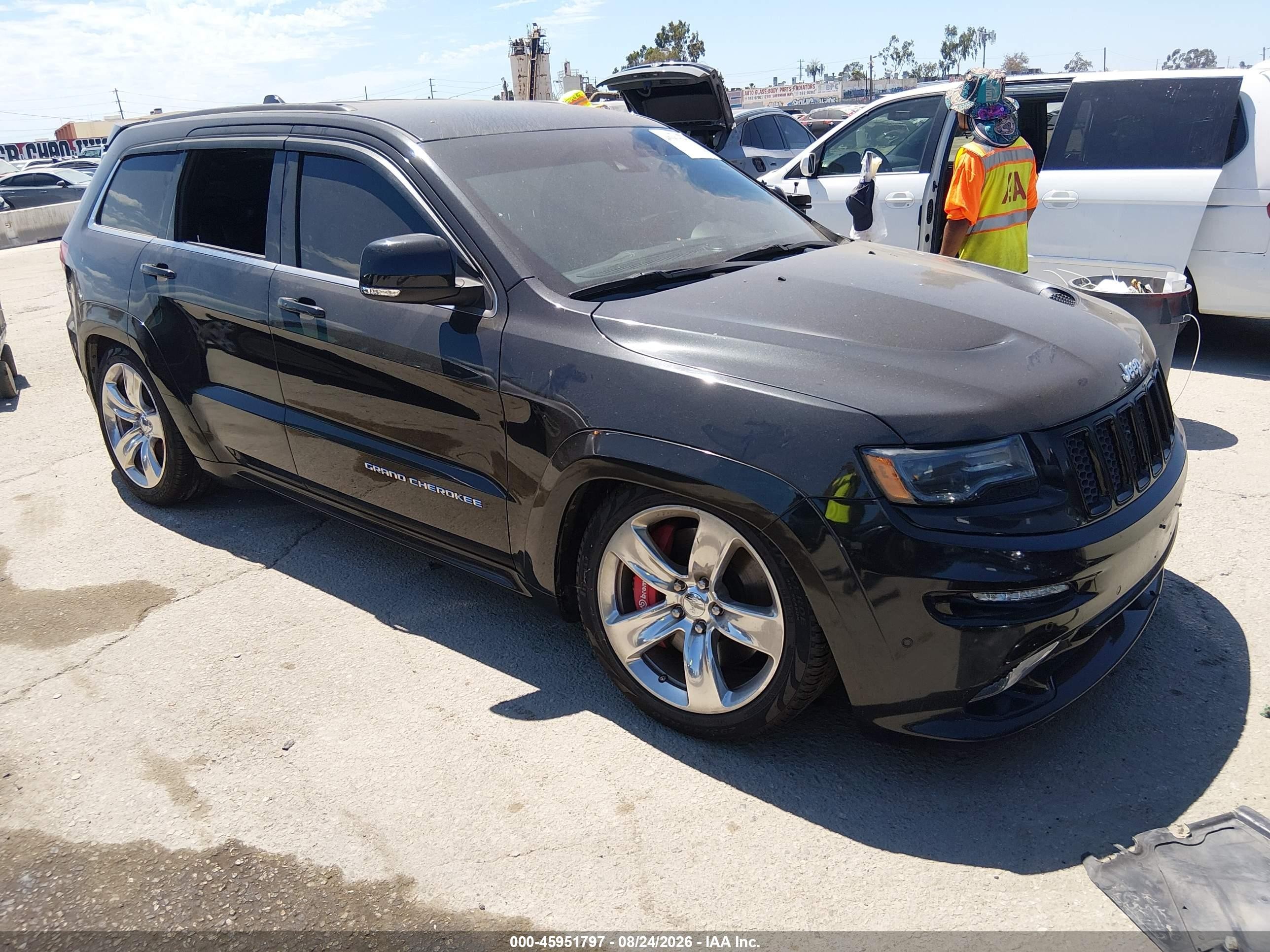 2014 Jeep Grand Cherokee VIN 1C4RJFDJ4EC319062 — IAAI salvage auction photo