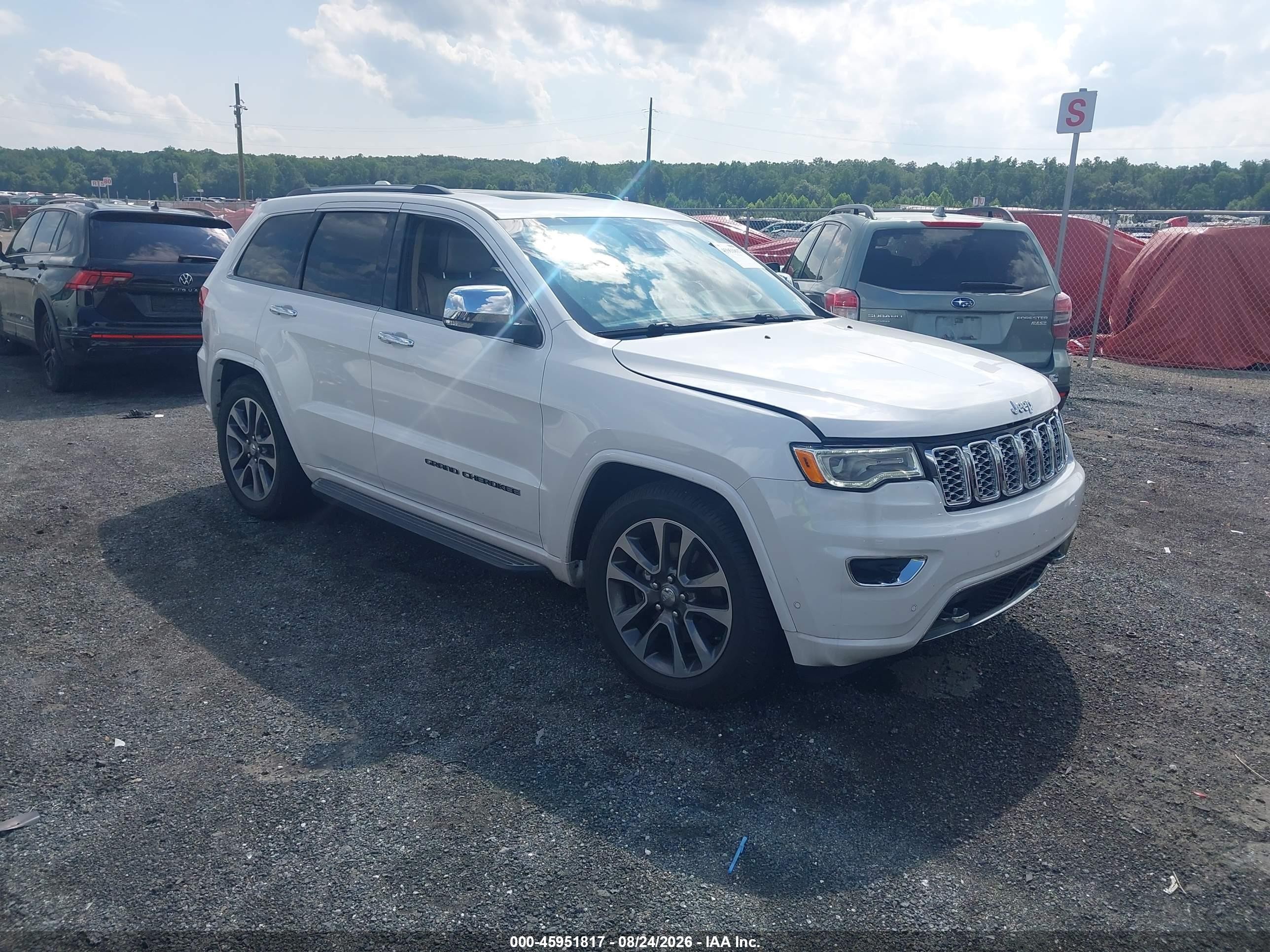 2018 Jeep Grand Cherokee VIN 1C4RJFCMXJC395990 — IAAI salvage auction photo