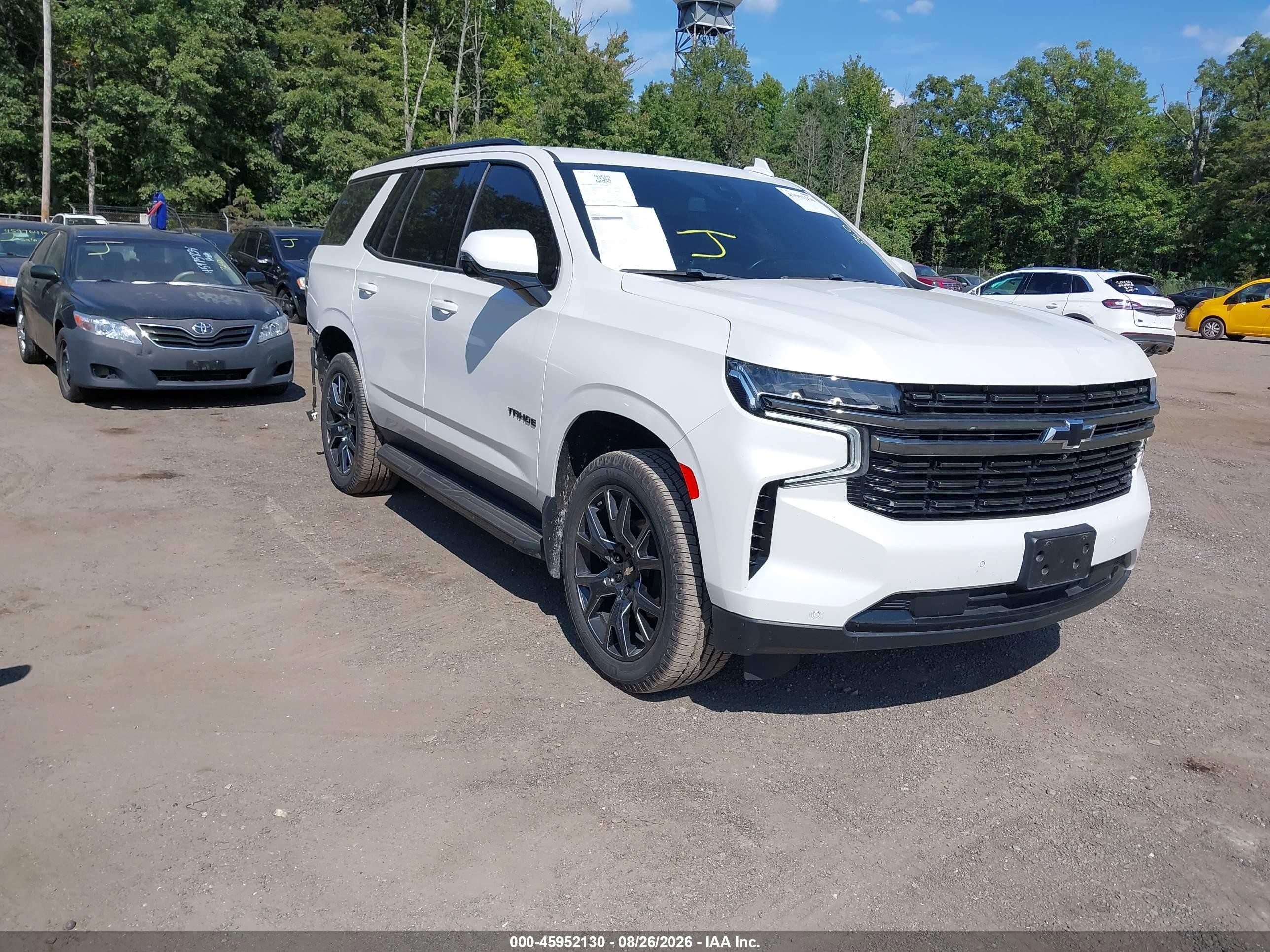 2021 Chevrolet Tahoe VIN 1GNSKRKD4MR215302 — IAAI salvage auction photo