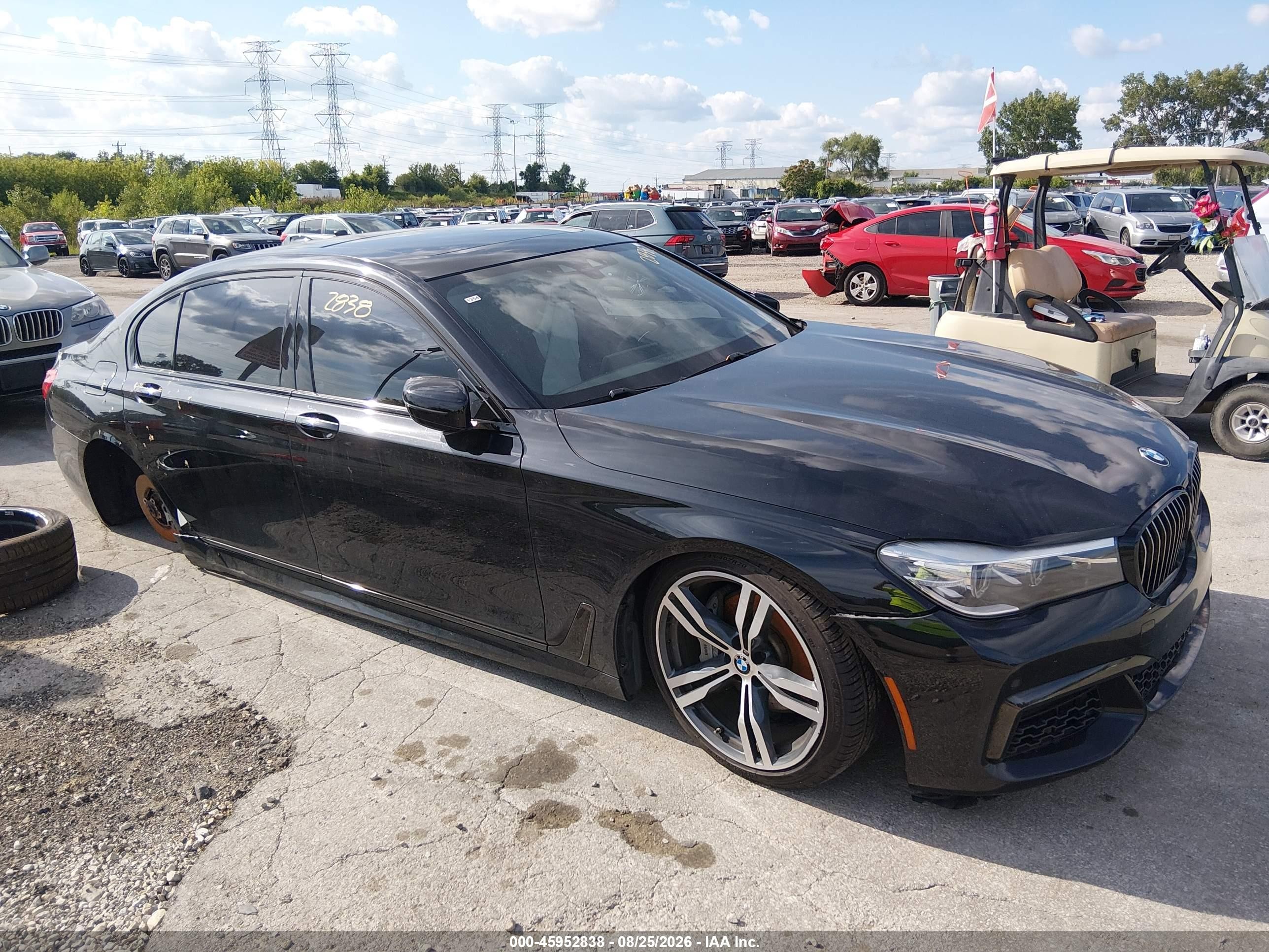 2018 BMW 7 Series VIN WBA7E4C55JGV24202 — IAAI salvage auction photo