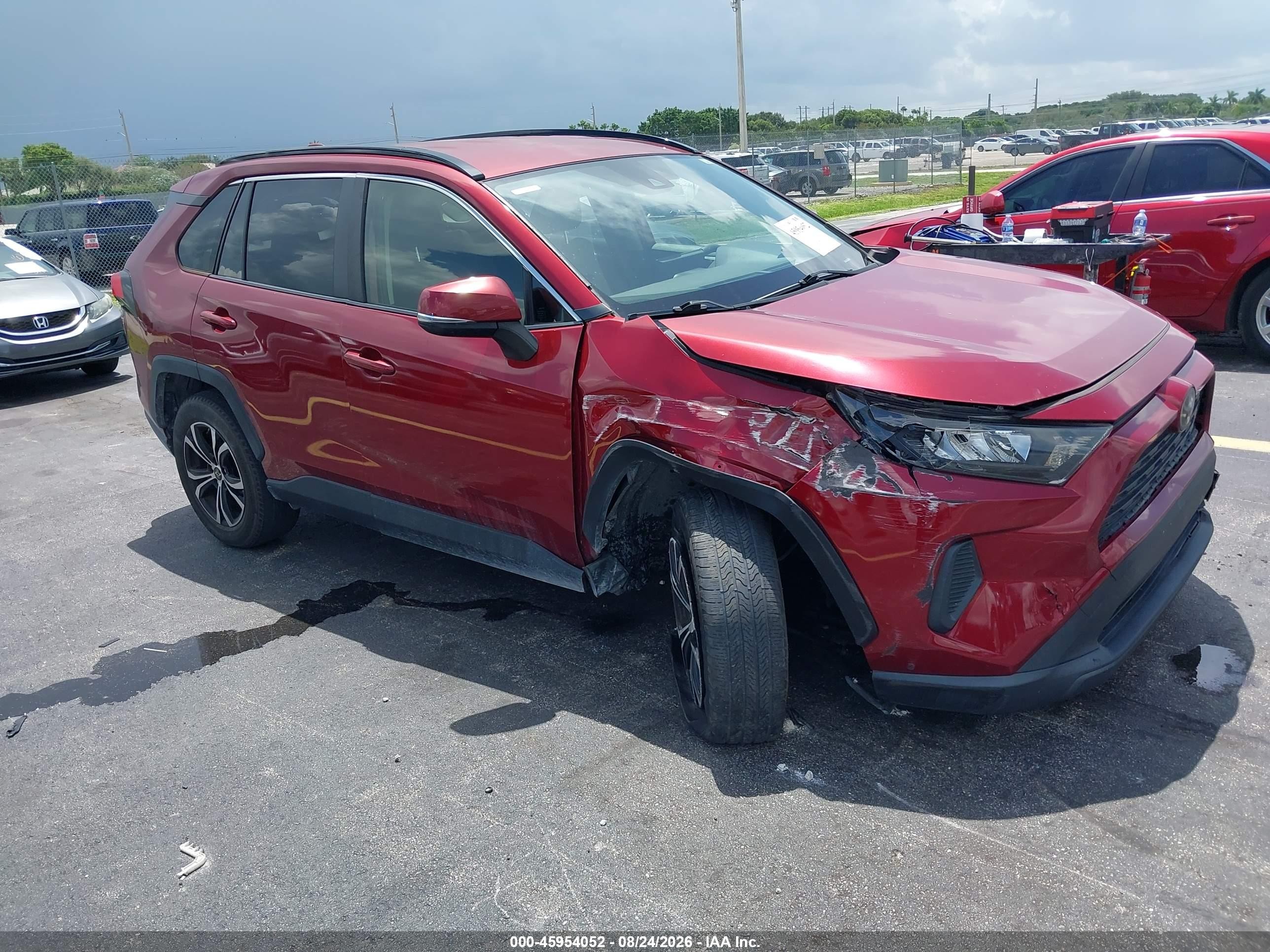 2019 Toyota RAV4 VIN JTMK1RFV7KD040293 — IAAI salvage auction photo