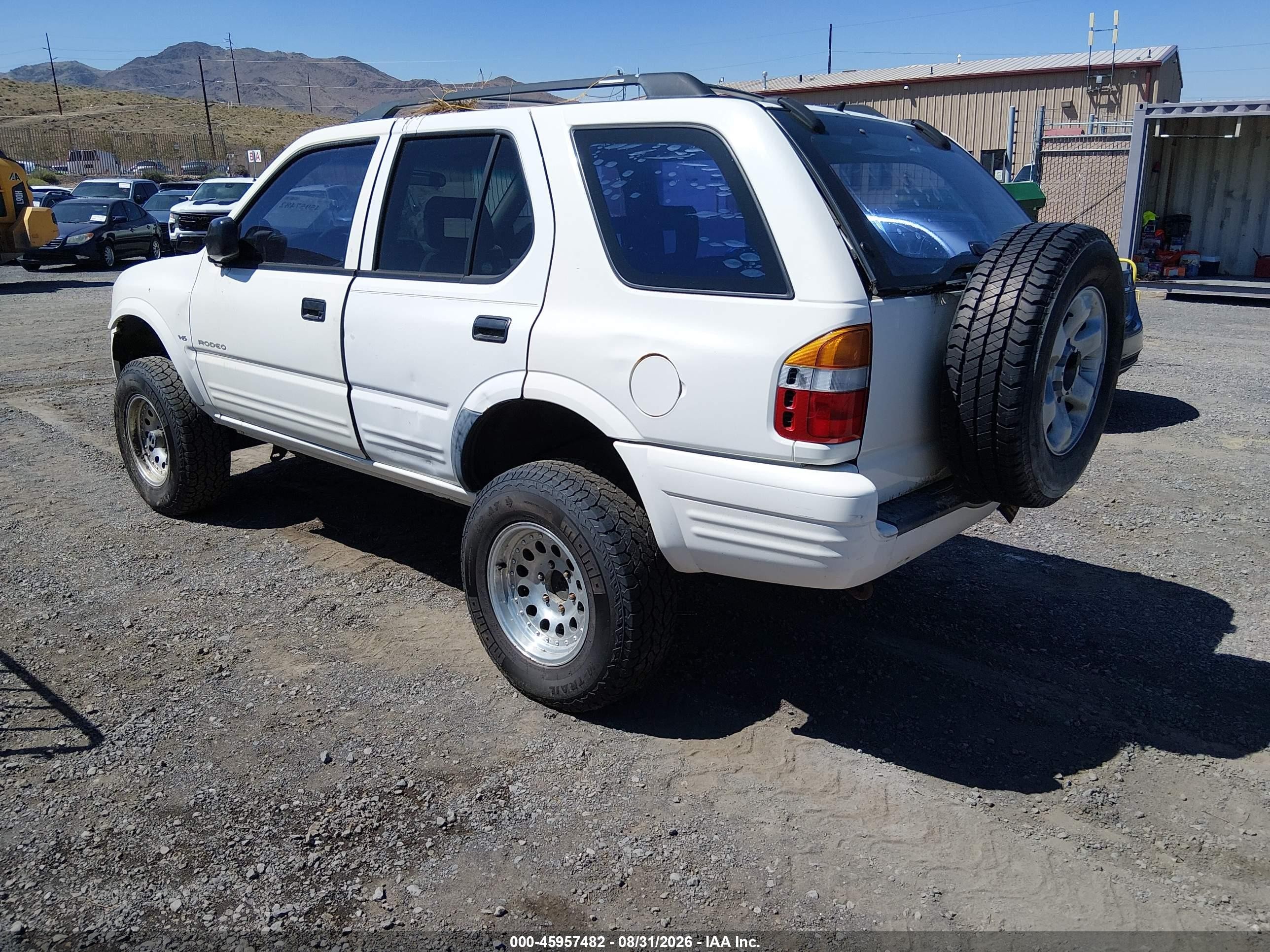 1999 Isuzu Rodeo VIN 4S2CM58WXX4361122 IAAI salvage auction — Normal Wear, Regular (Nevada), sold $25 on 2026-09-04 (photo 3)