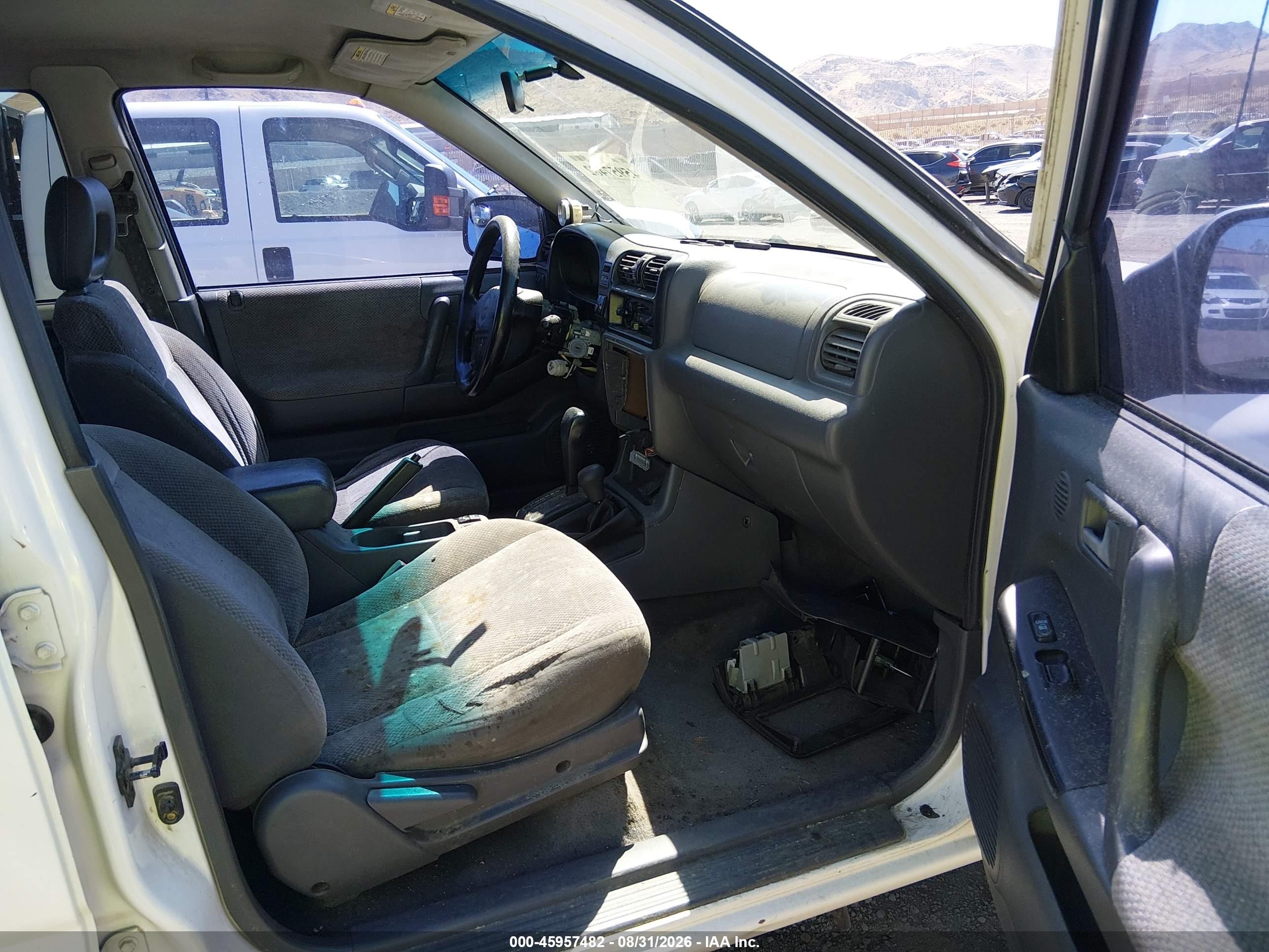 1999 Isuzu Rodeo VIN 4S2CM58WXX4361122 IAAI salvage auction — Normal Wear, Regular (Nevada), sold $25 on 2026-09-04 (photo 5)