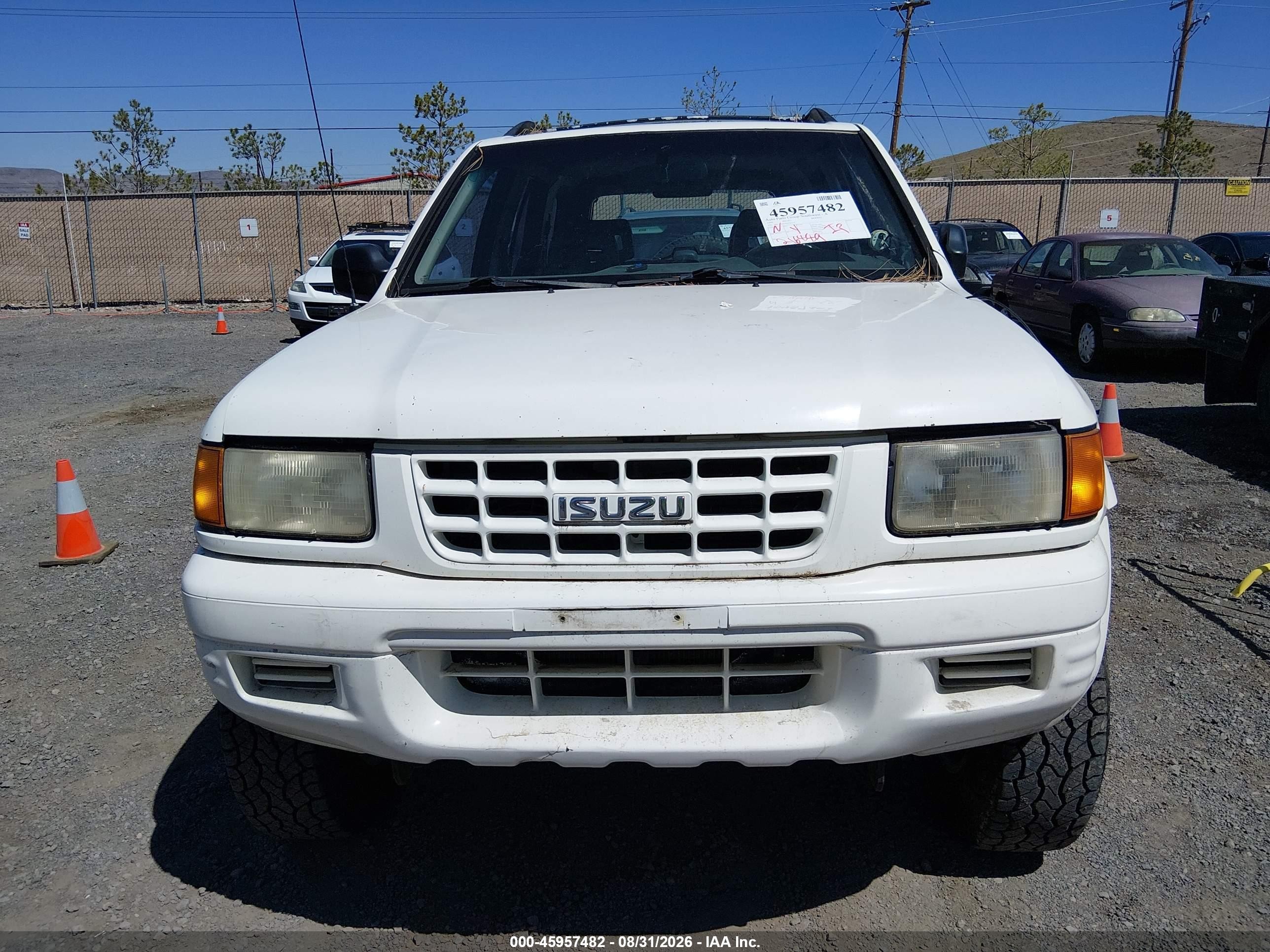 1999 Isuzu Rodeo VIN 4S2CM58WXX4361122 IAAI salvage auction — Normal Wear, Regular (Nevada), sold $25 on 2026-09-04 (photo 6)