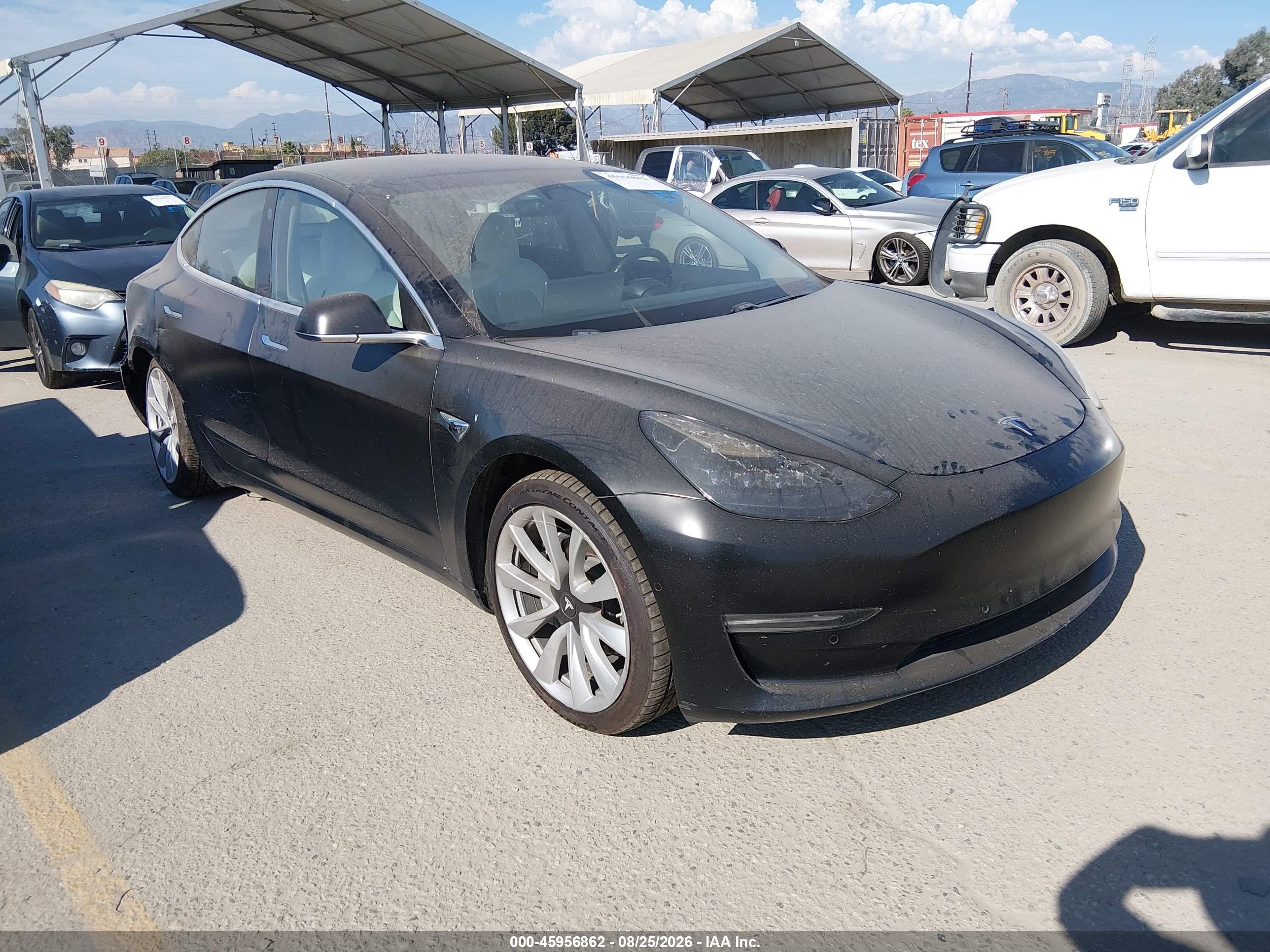 2018 Tesla Model 3 VIN 5YJ3E1EB3JF188417 — IAAI salvage auction photo