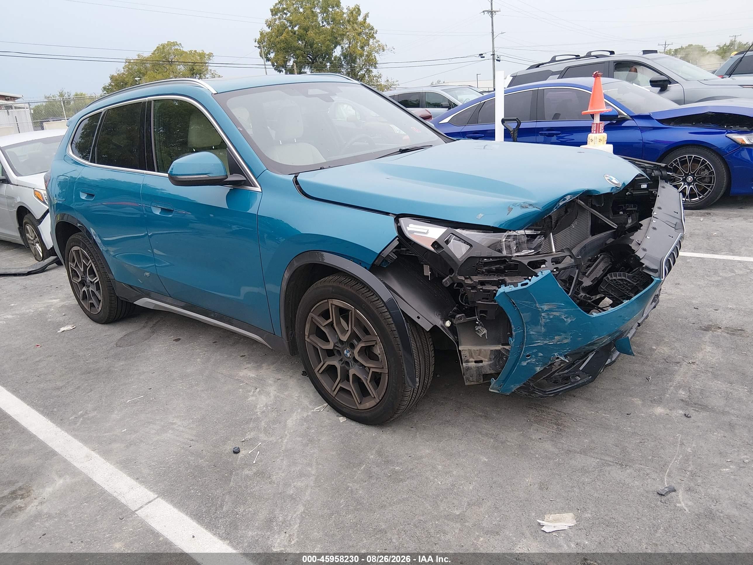 2025 BMW X1 VIN WBX73EF09S5235497 — IAAI salvage auction photo