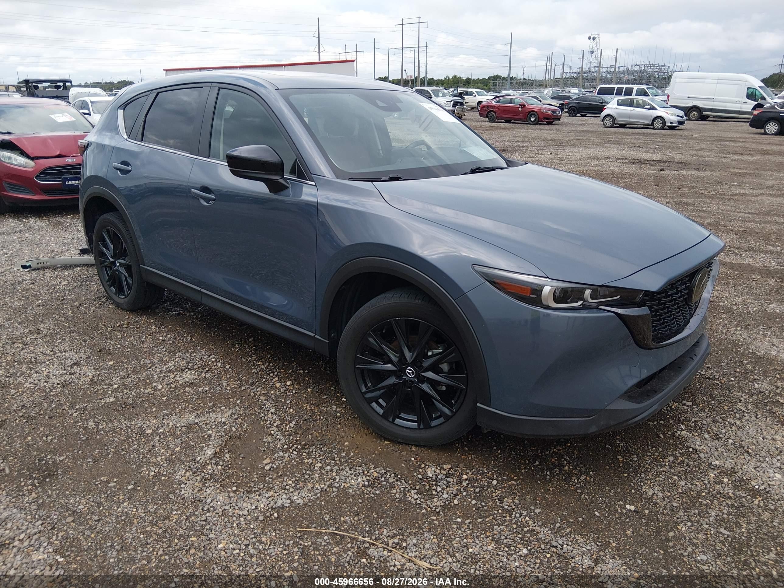 2023 Mazda CX-5 VIN JM3KFBCM4P0281089 — IAAI salvage auction photo