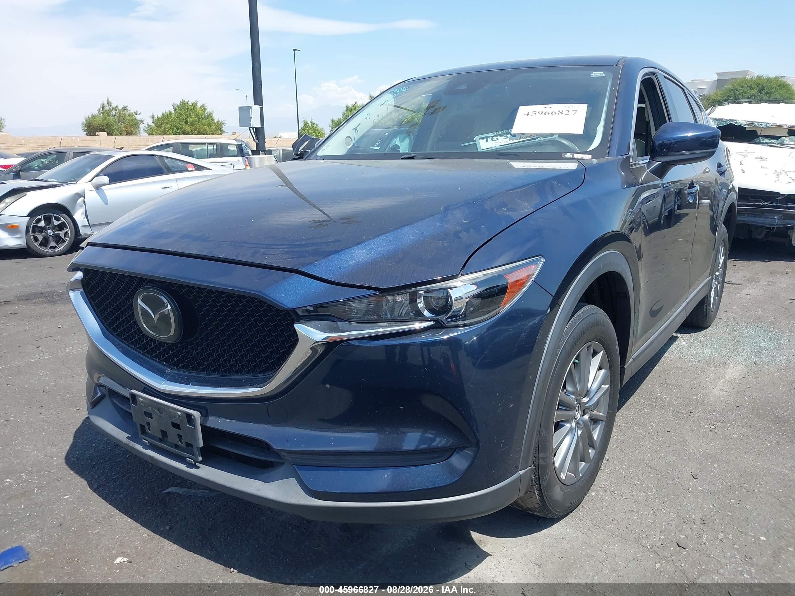 2017 Mazda CX-5 VIN JM3KFACL3H0151386 IAAI salvage auction — Rear End, Wait Title, sold $4,300 on 2026-09-21 (photo 2)