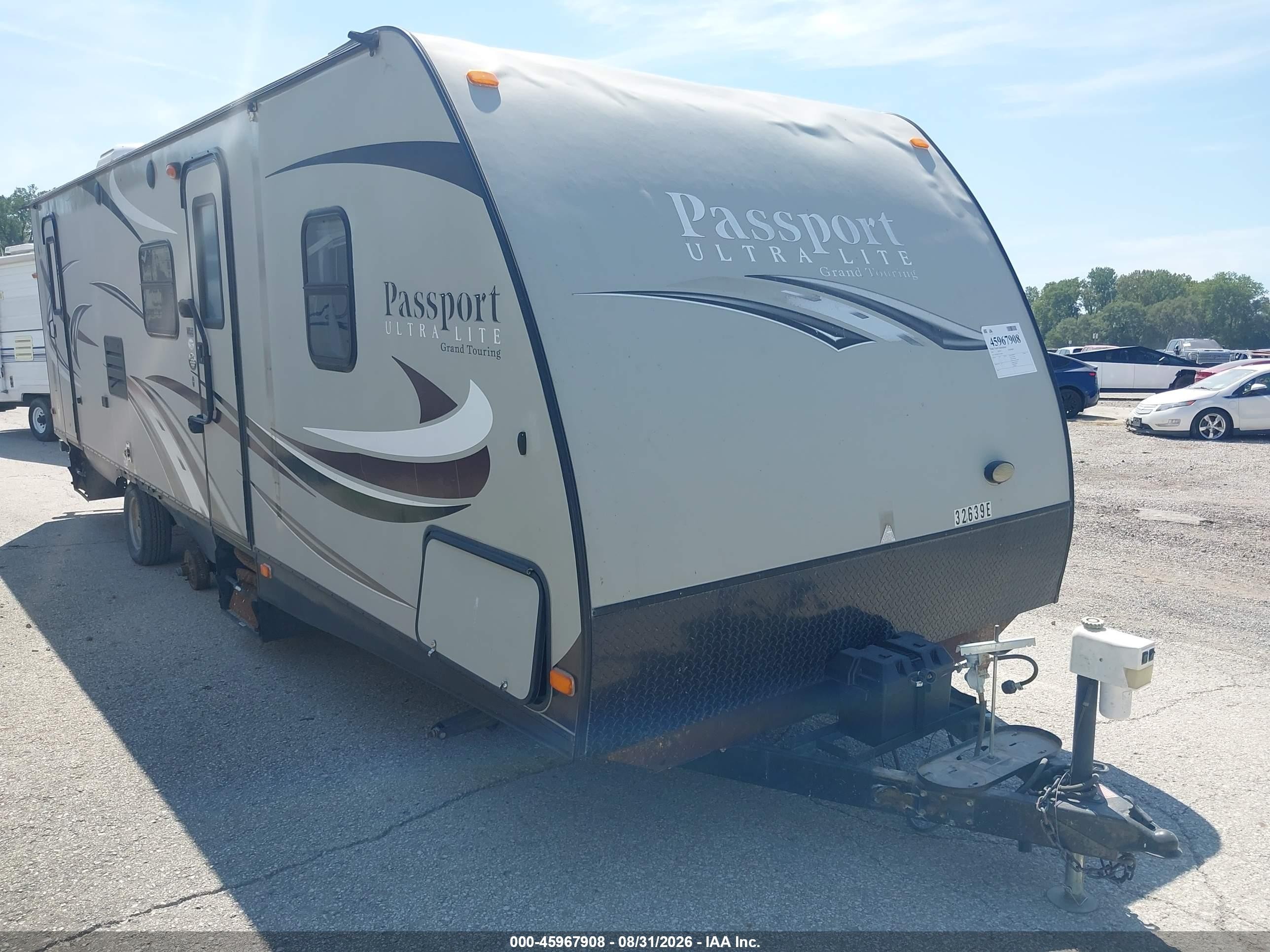 2015 Keys Passport VIN 4YDT28127FT410028 IAAI salvage auction — Side, Salvage (Missouri), sold $1,200 on 2026-09-30 (photo 1)