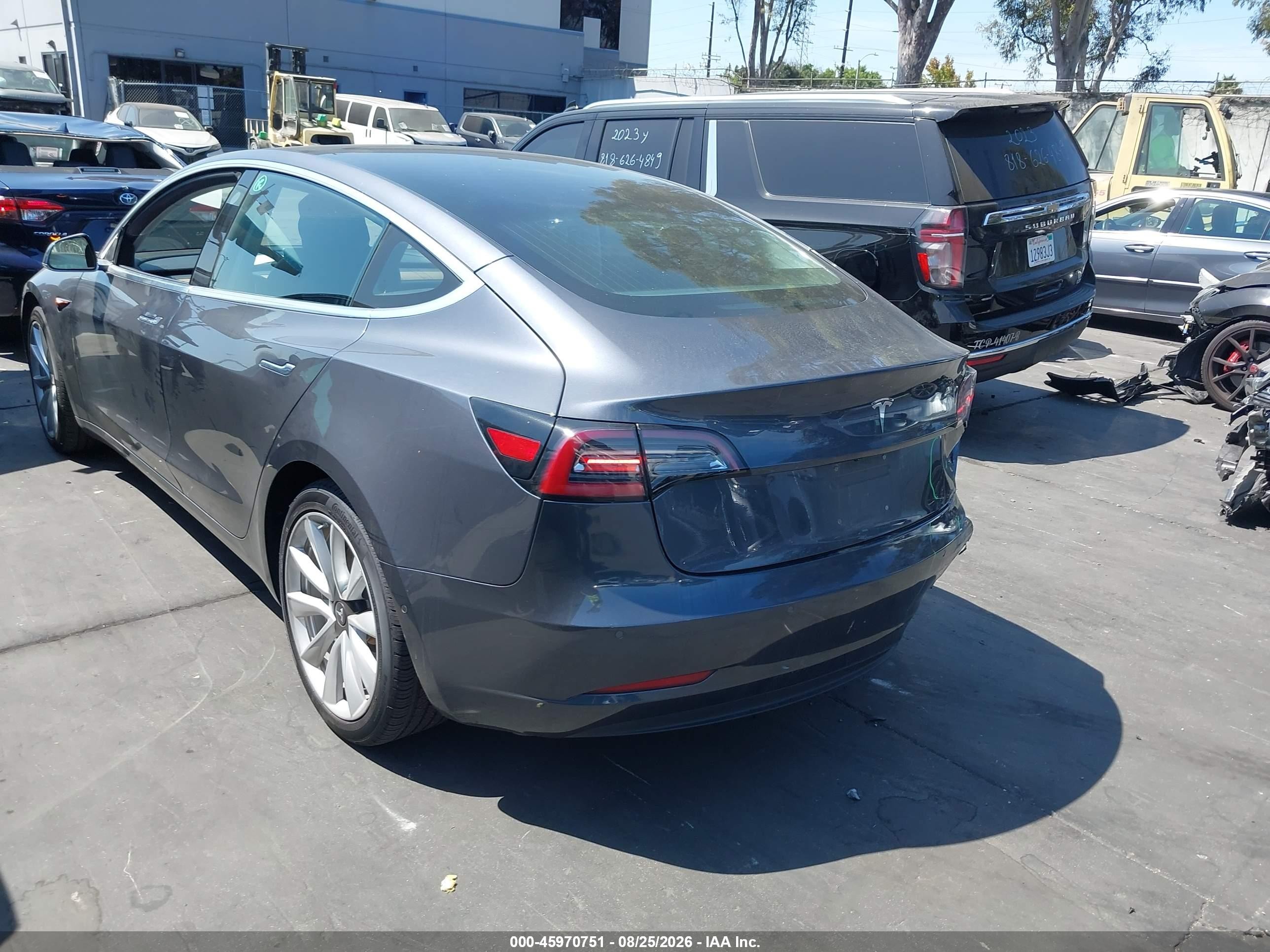 2018 Tesla Model 3 VIN 5YJ3E1EA5JF163087 IAAI salvage auction — Rear End, Salvage Certificate (California), sold $4,100 on 2026-09-13 (photo 3)