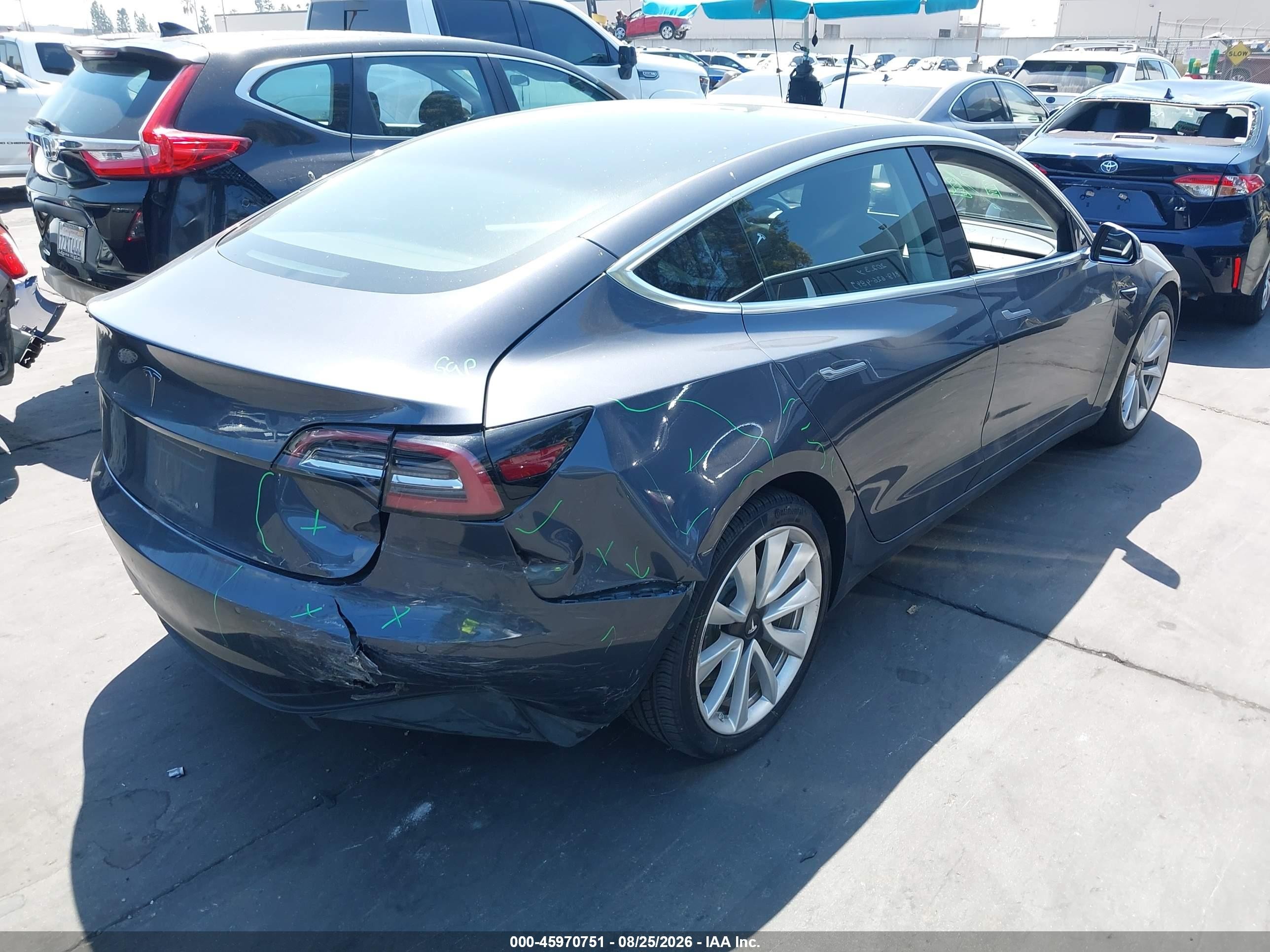 2018 Tesla Model 3 VIN 5YJ3E1EA5JF163087 IAAI salvage auction — Rear End, Salvage Certificate (California), sold $4,100 on 2026-09-13 (photo 4)