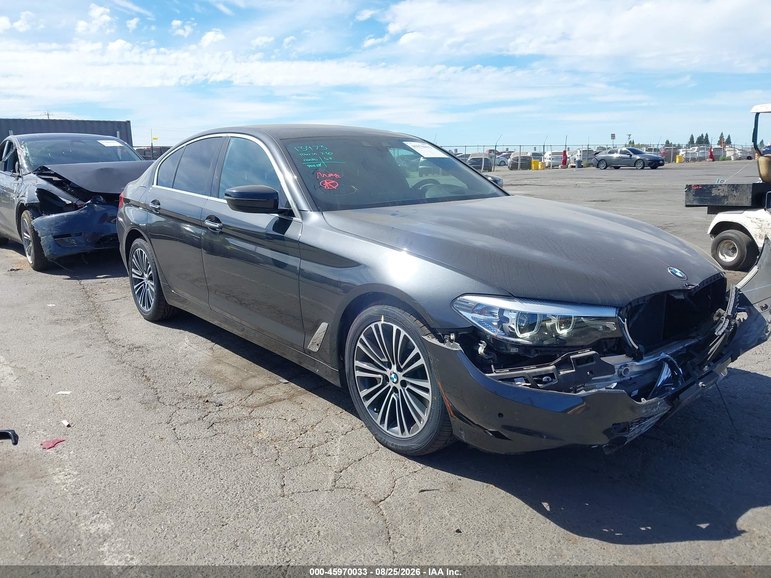 2018 BMW 5 Series VIN WBAJA5C50JG899339 — IAAI salvage auction photo