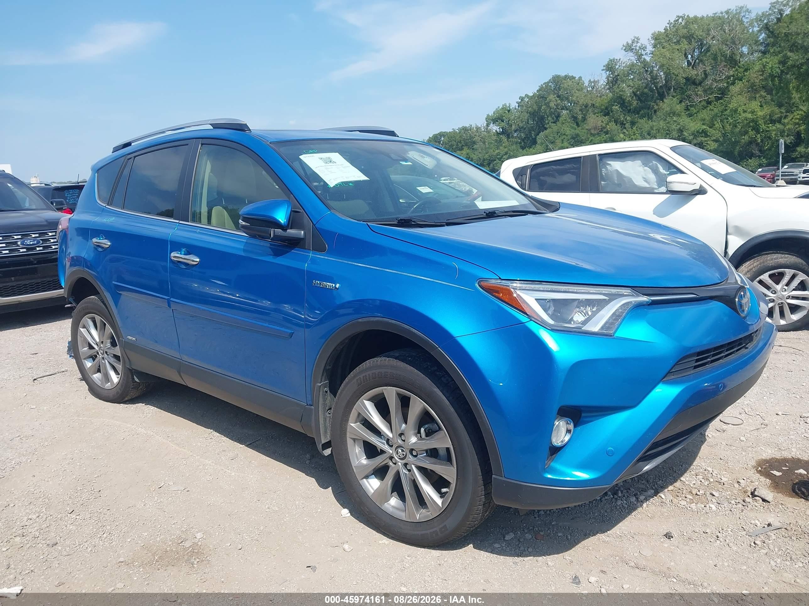 2018 Toyota RAV4 Hybrid VIN JTMDJREV0JD154015 — IAAI salvage auction photo