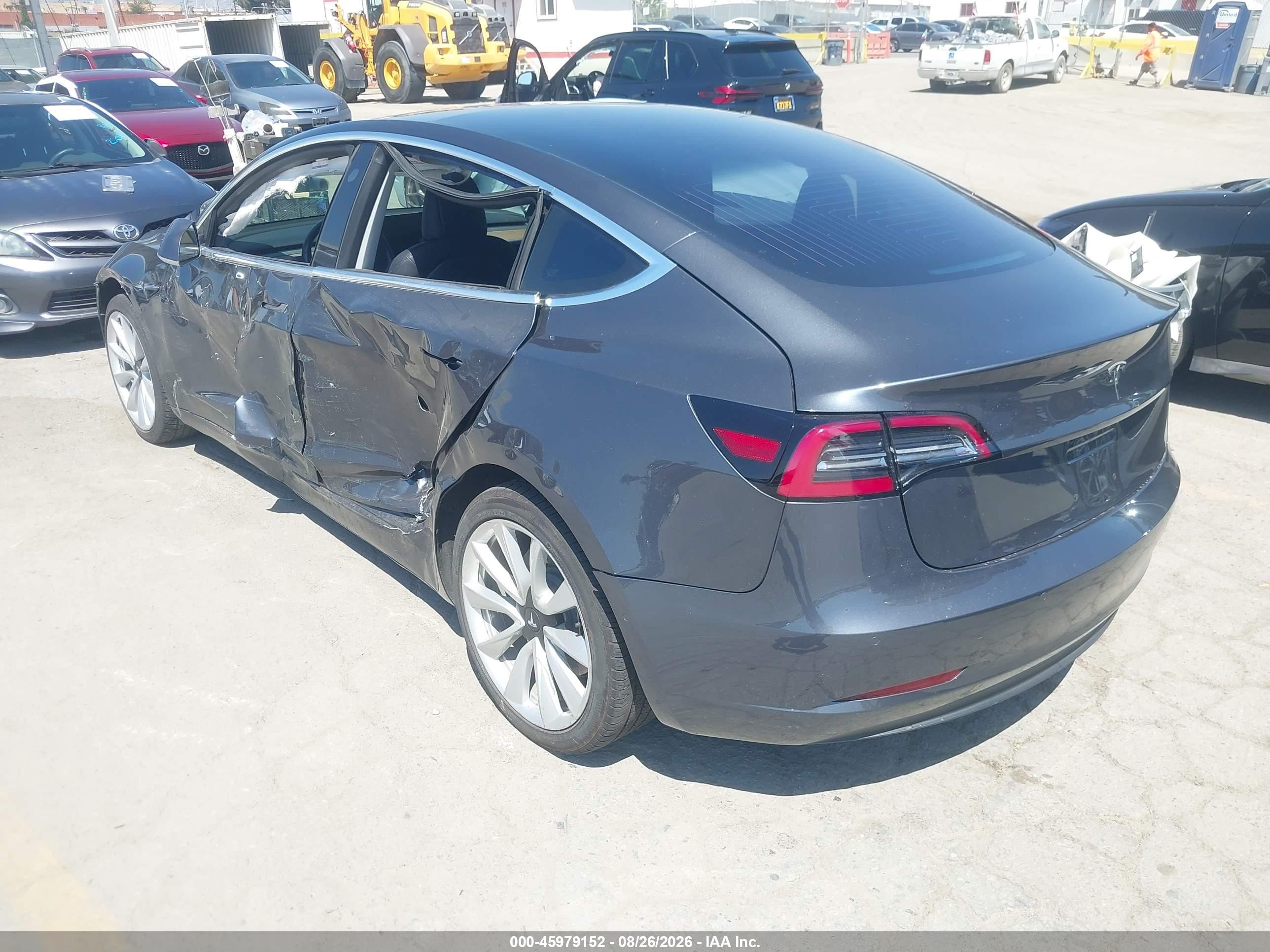 2018 Tesla Model 3 VIN 5YJ3E1EA5JF012086 IAAI salvage auction — Side, Salvage (California), sold $4,500 on 2026-09-13 (photo 3)