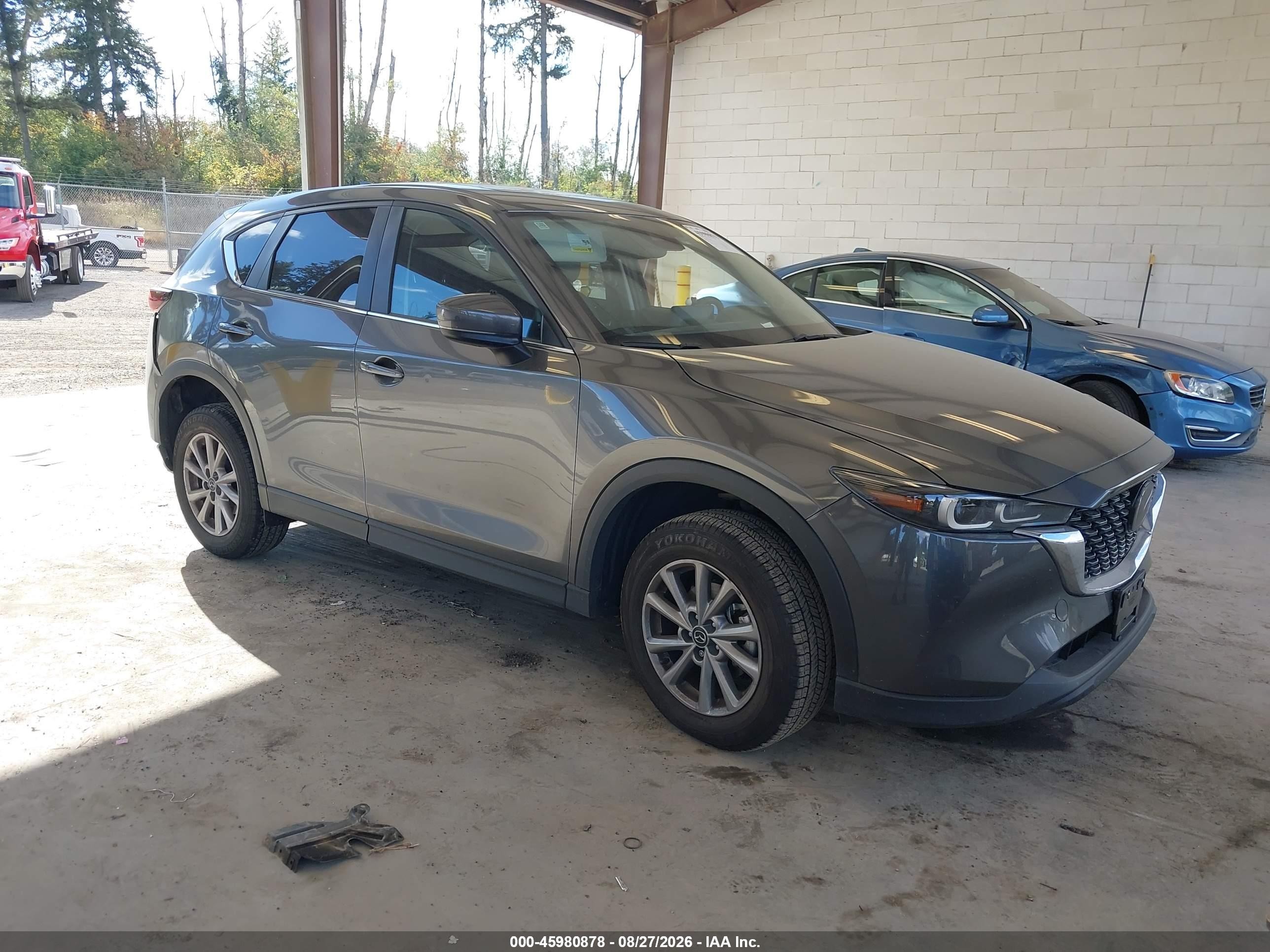 2023 Mazda CX-5 VIN JM3KFBCM0P0186125 — IAAI salvage auction photo
