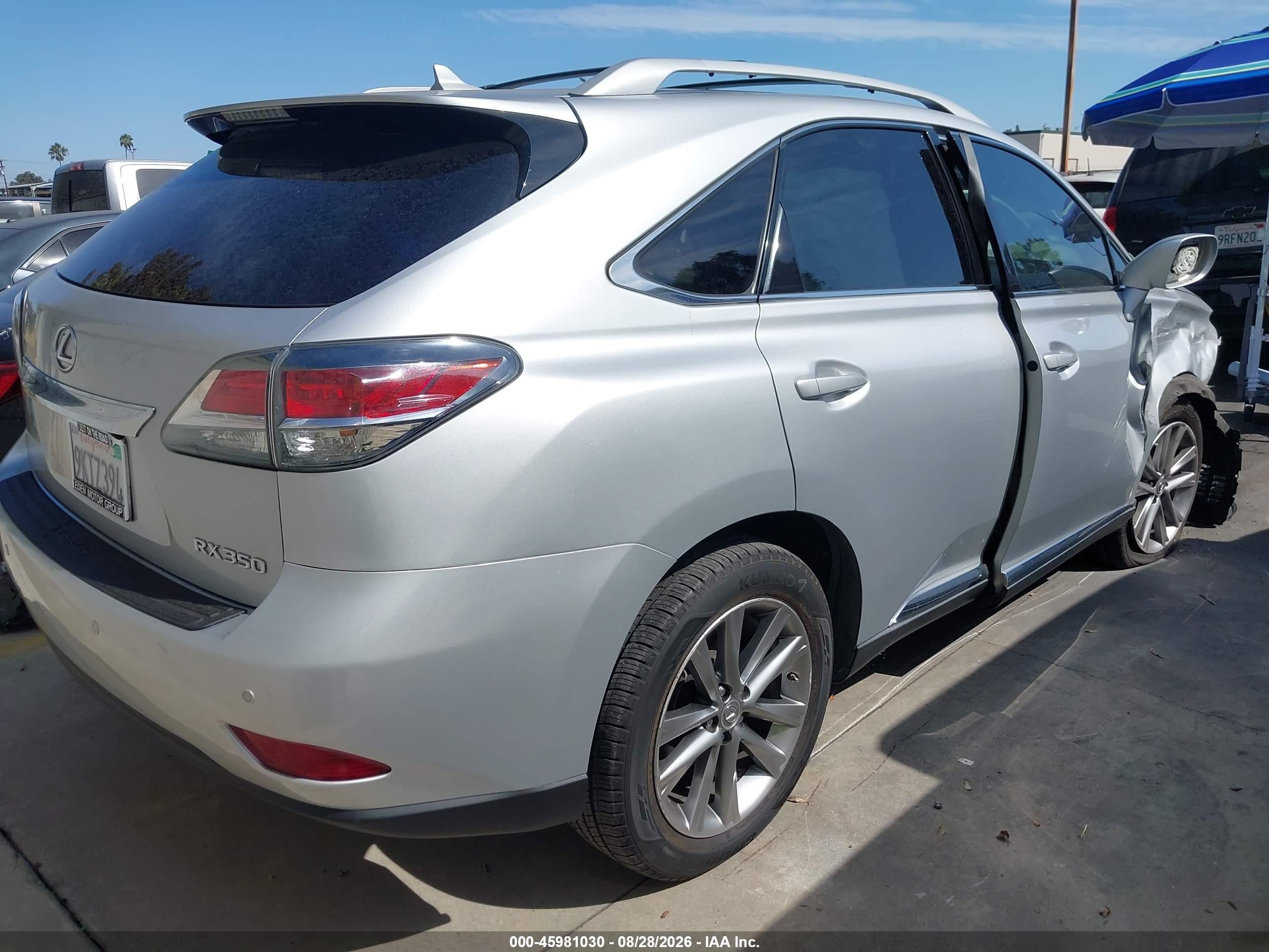 2013 Lexus RX 350 VIN 2T2ZK1BA4DC093013 IAAI salvage auction — Side, Salvage Certificate (California), sold $4,150 on 2026-09-13 (photo 4)