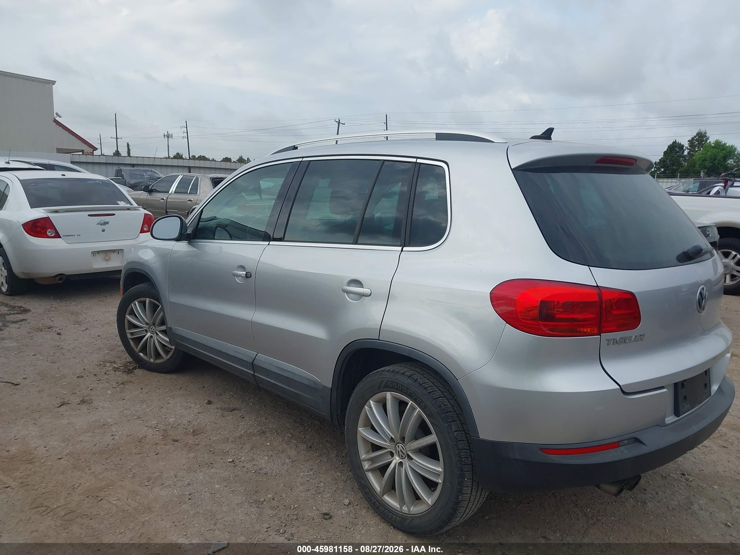 2014 Volkswagen Tiguan VIN WVGAV3AX4EW622202 IAAI salvage auction — Water/Flood, Salvage (Texas), sold $625 on 2026-10-05 (photo 3)