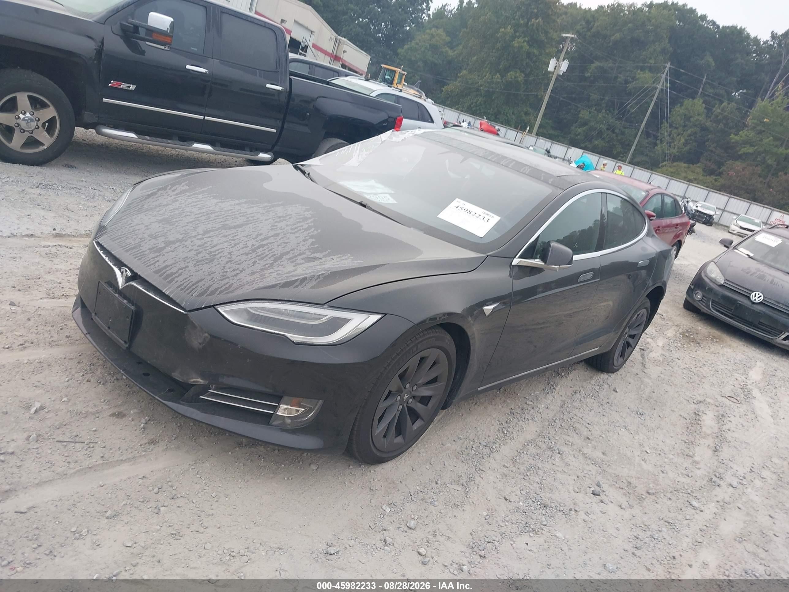 2018 Tesla Model s VIN 5YJSA1E2XJF273374 IAAI salvage auction — All Over, Salvage (Idaho), sold $7,000 on 2026-10-08 (photo 2)