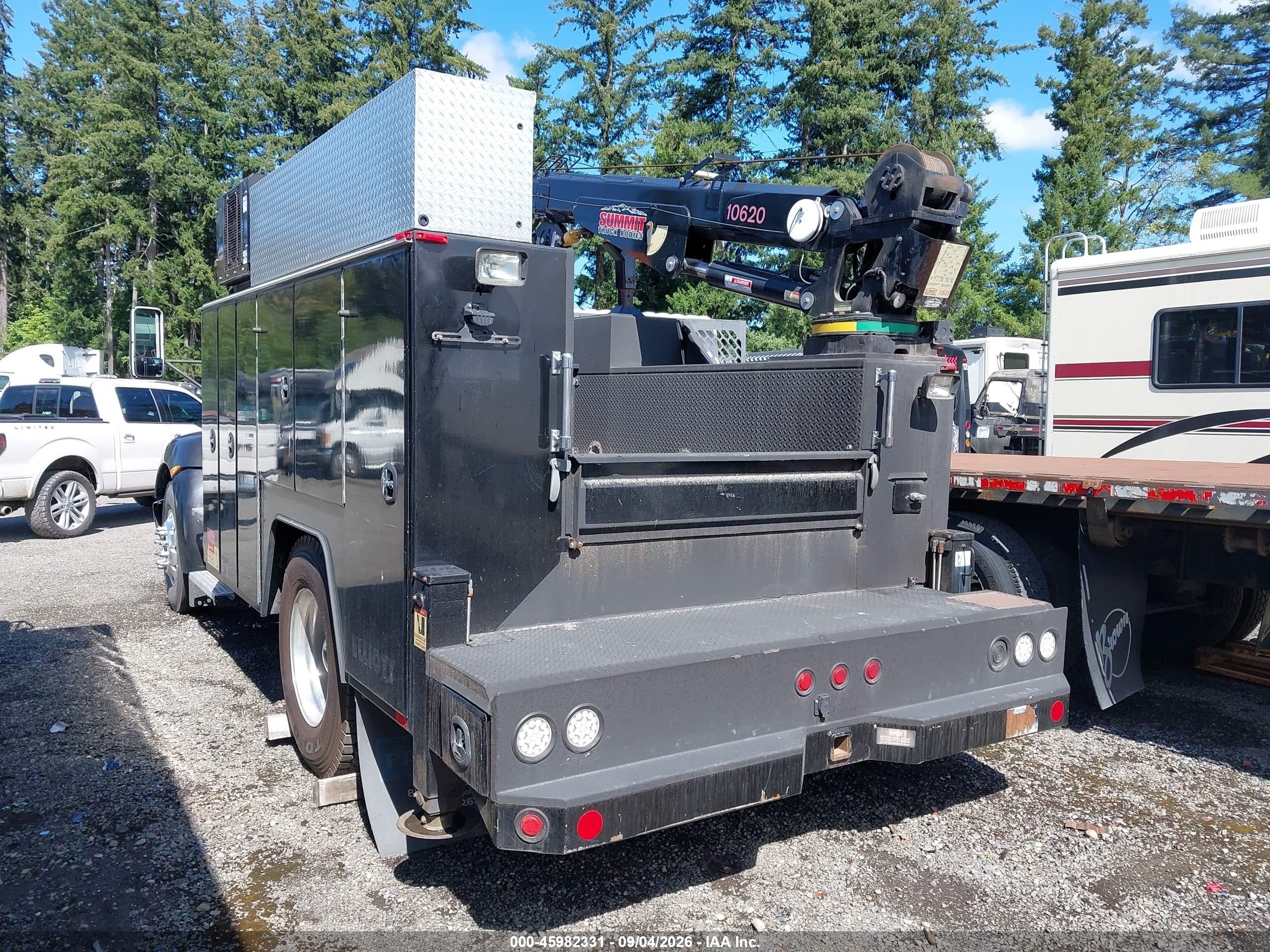 2009 Kenworth Construction VIN 2NKHHN6X29M256863 IAAI salvage auction — Side, Enterprise Vehicles Clear Only (Washington), sold $14,700 on 2026-09-09 (photo 3)