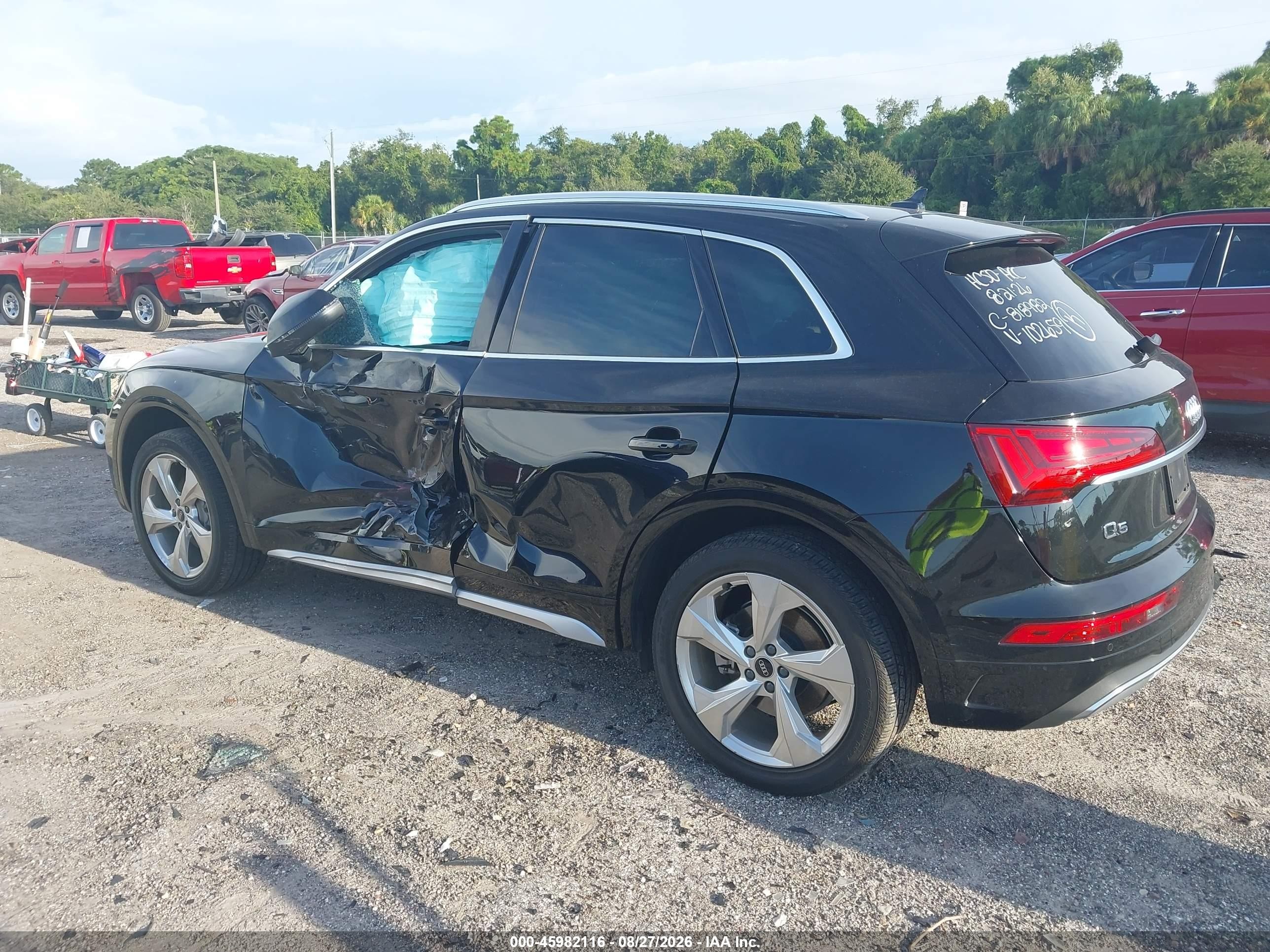 2021 Audi Q5 VIN WA1BAAFYXM2102659 IAAI salvage auction — Side, Rebuildable (Florida), sold $9,700 on 2026-10-12 (photo 6)