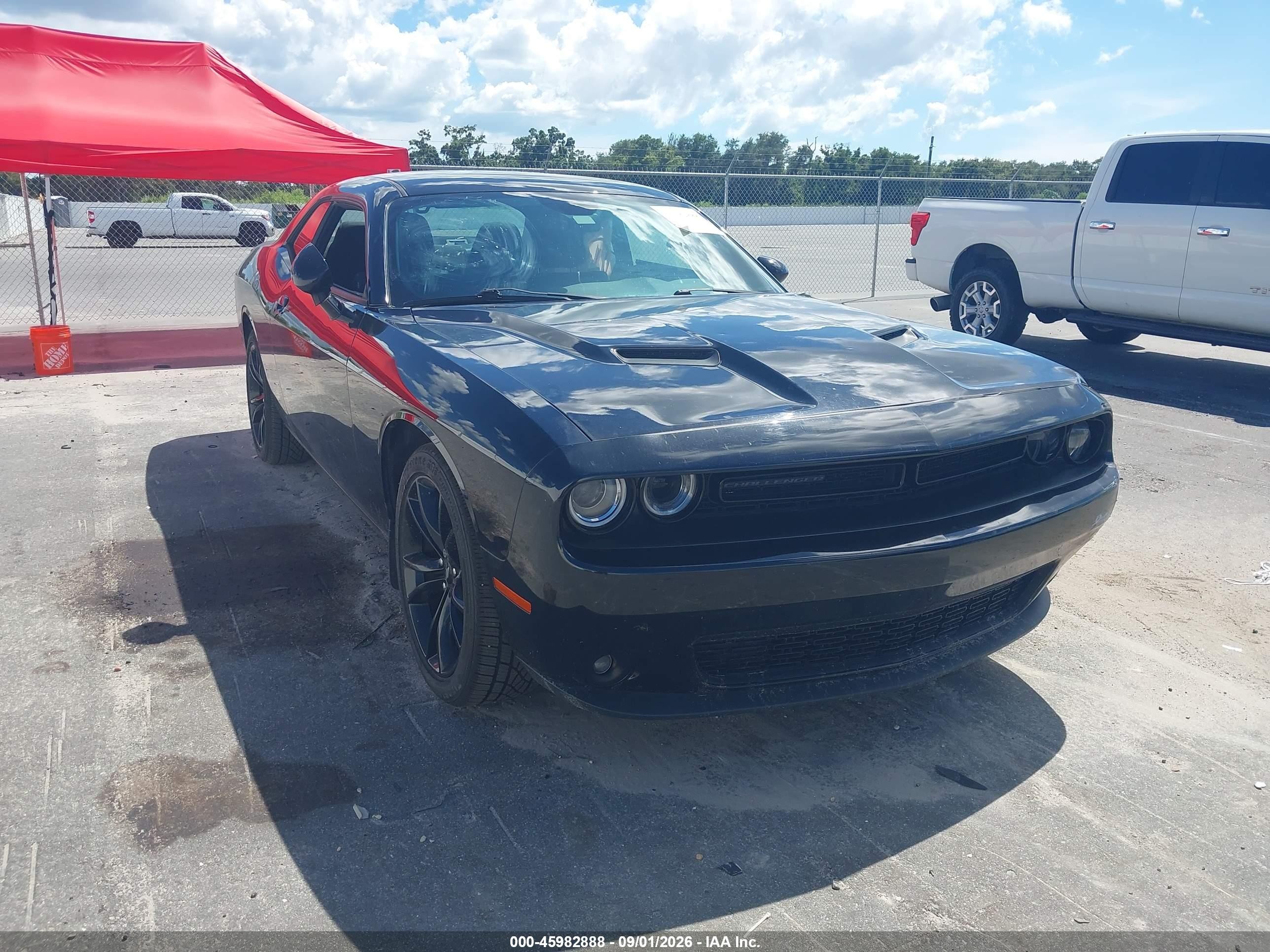 2018 Dodge Challenger VIN 2C3CDZAGXJH318260 IAAI salvage auction — Side, Rebuildable (Florida), sold $5,000 on 2026-10-03 (photo 1)