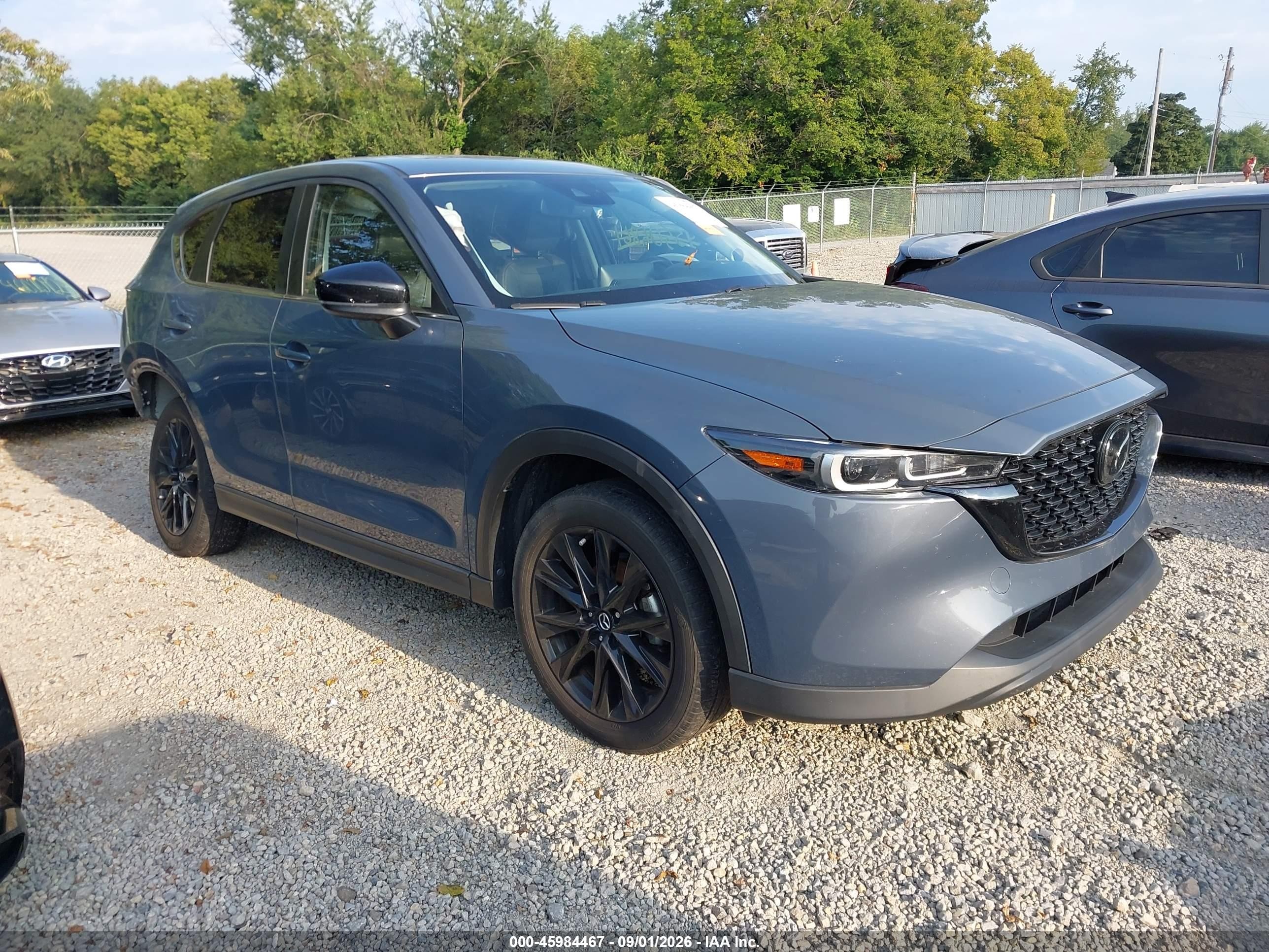 2023 Mazda CX-5 VIN JM3KFBCM7P0214342 — IAAI salvage auction photo