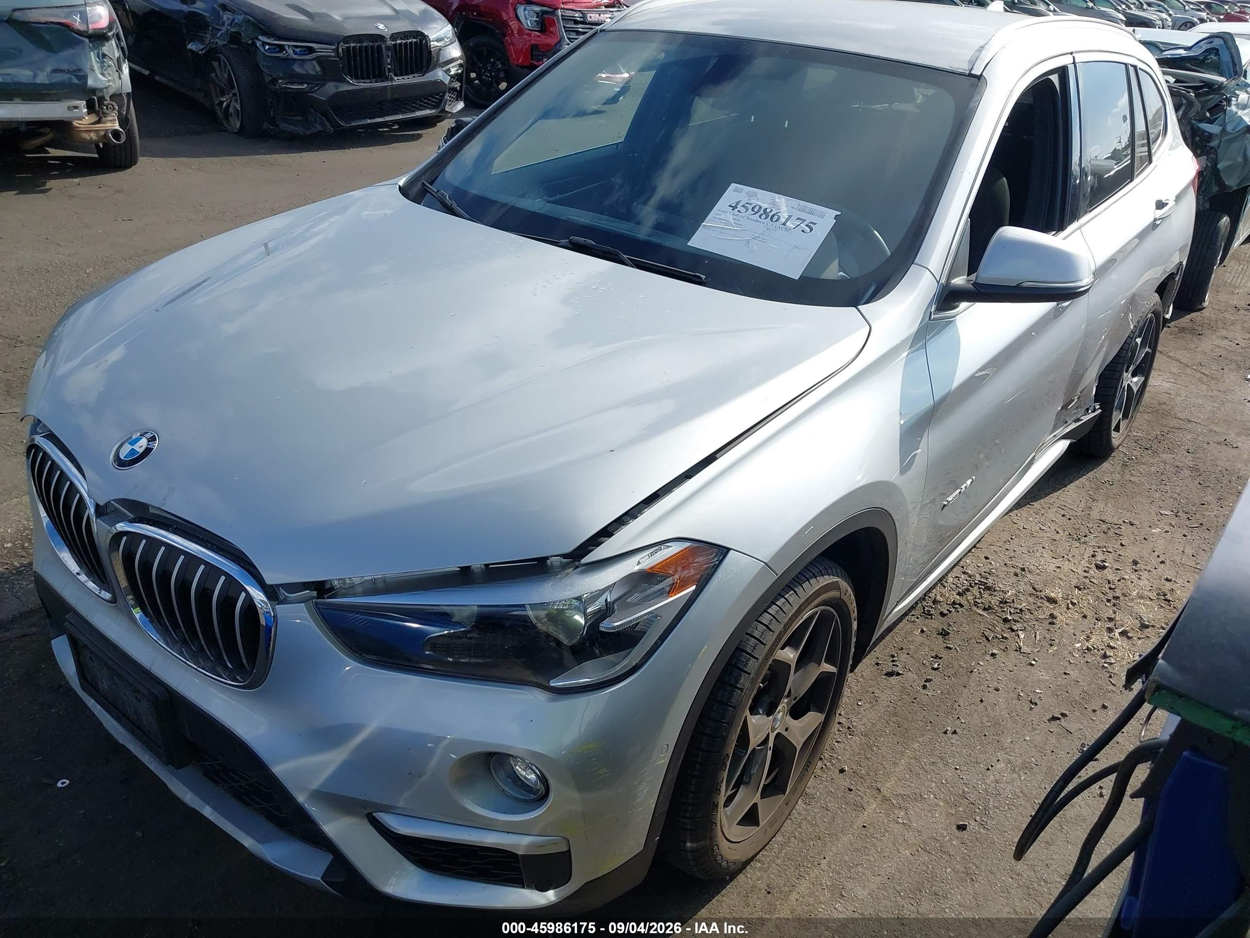 2016 BMW X1 VIN WBXHT3C33G5F65699 IAAI salvage auction — Side, Salvage Certificate (California), sold $4,950 on 2026-09-12 (photo 2)
