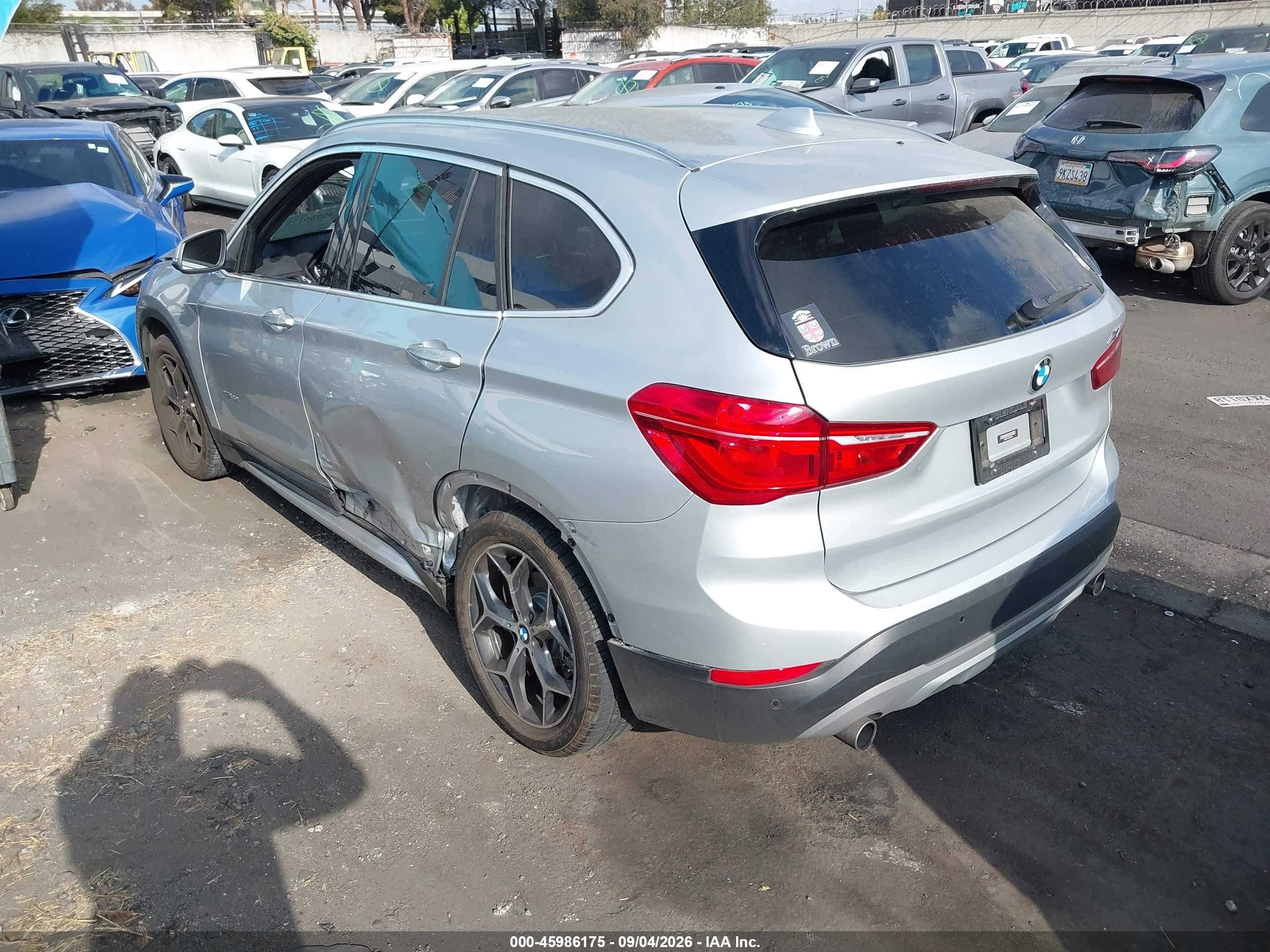 2016 BMW X1 VIN WBXHT3C33G5F65699 IAAI salvage auction — Side, Salvage Certificate (California), sold $4,950 on 2026-09-12 (photo 3)