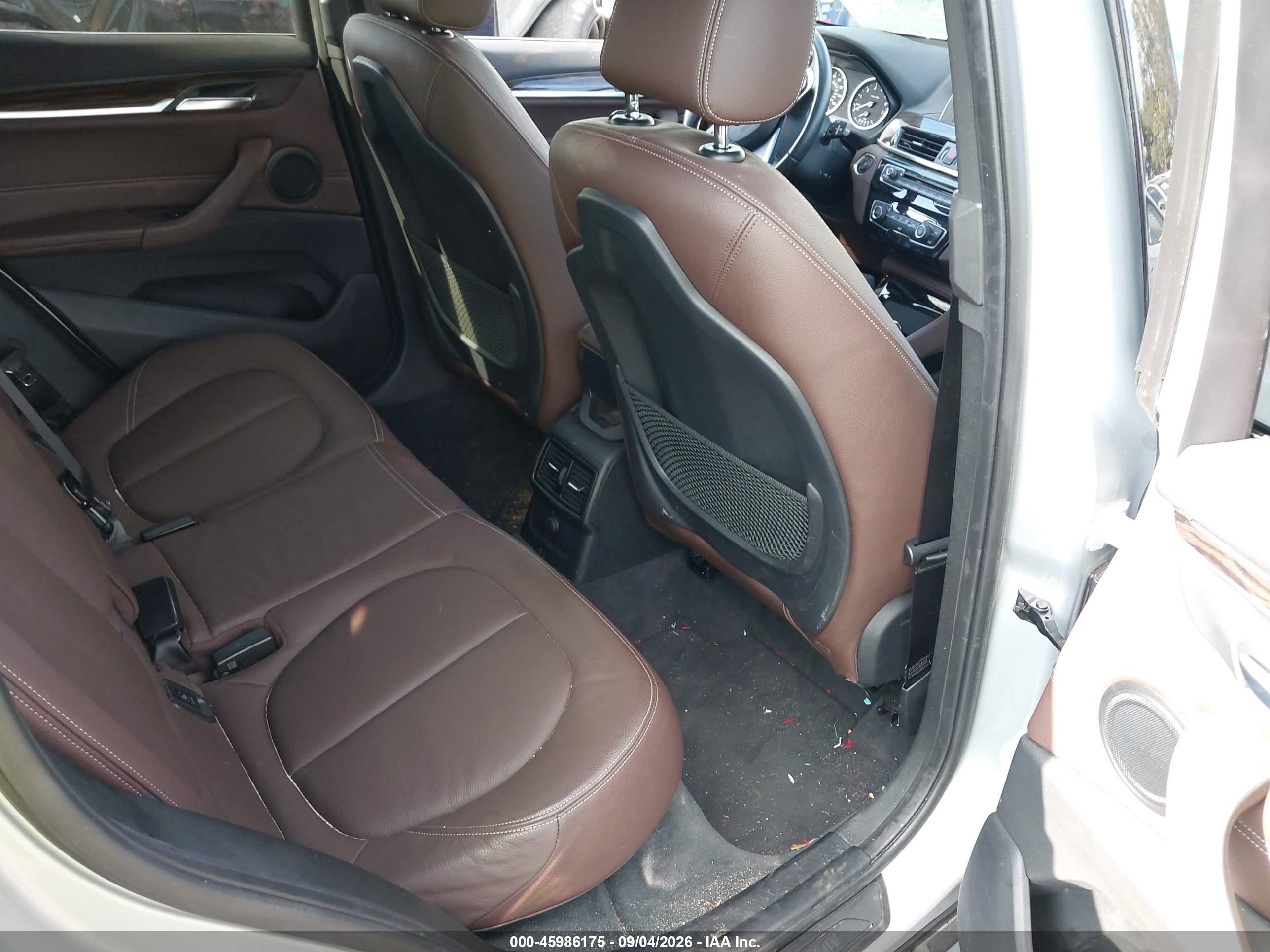 2016 BMW X1 VIN WBXHT3C33G5F65699 IAAI salvage auction — Side, Salvage Certificate (California), sold $4,950 on 2026-09-12 (photo 8)