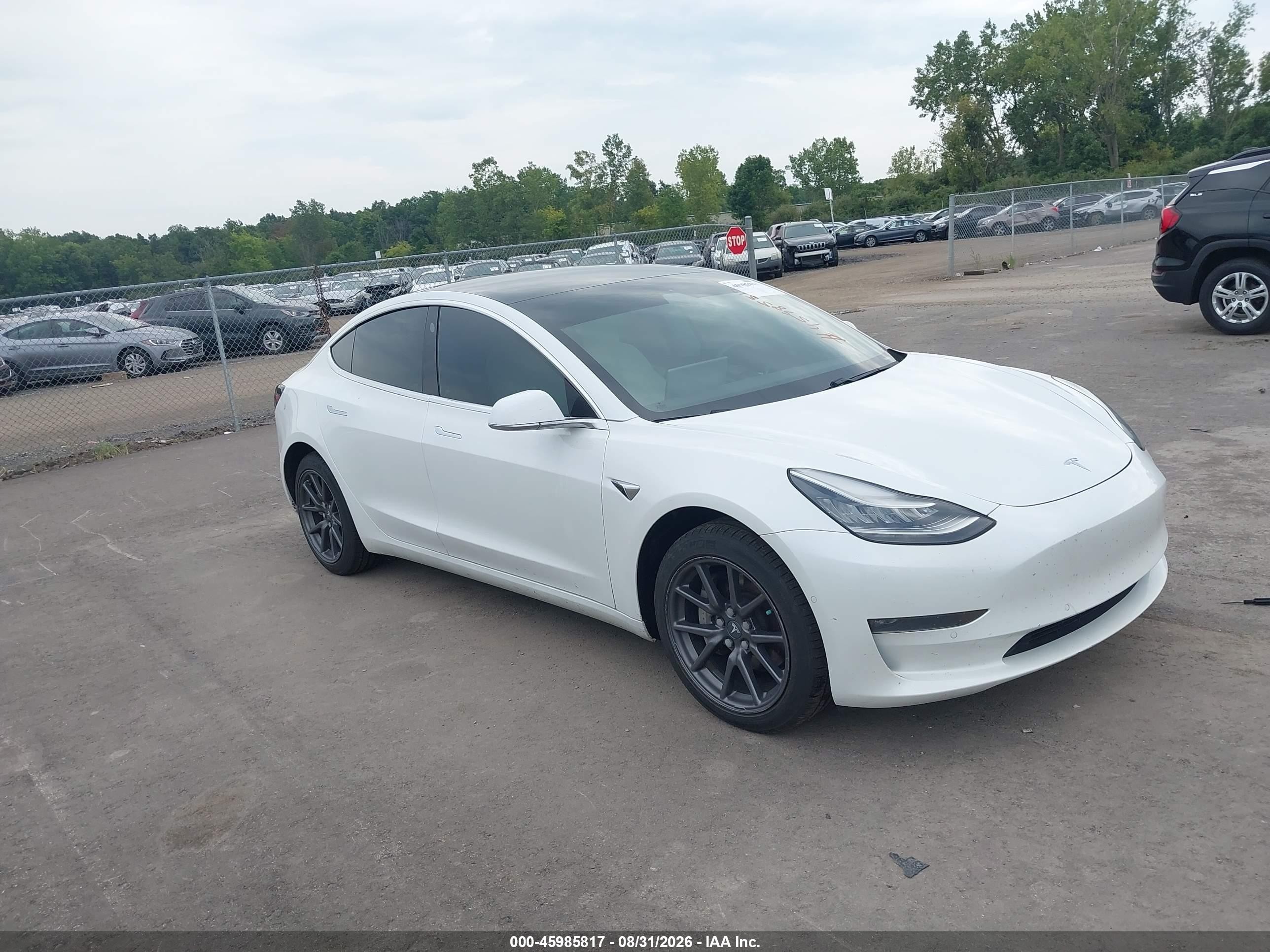 2020 Tesla Model 3 VIN 5YJ3E1EB0LF720130 — IAAI salvage auction photo