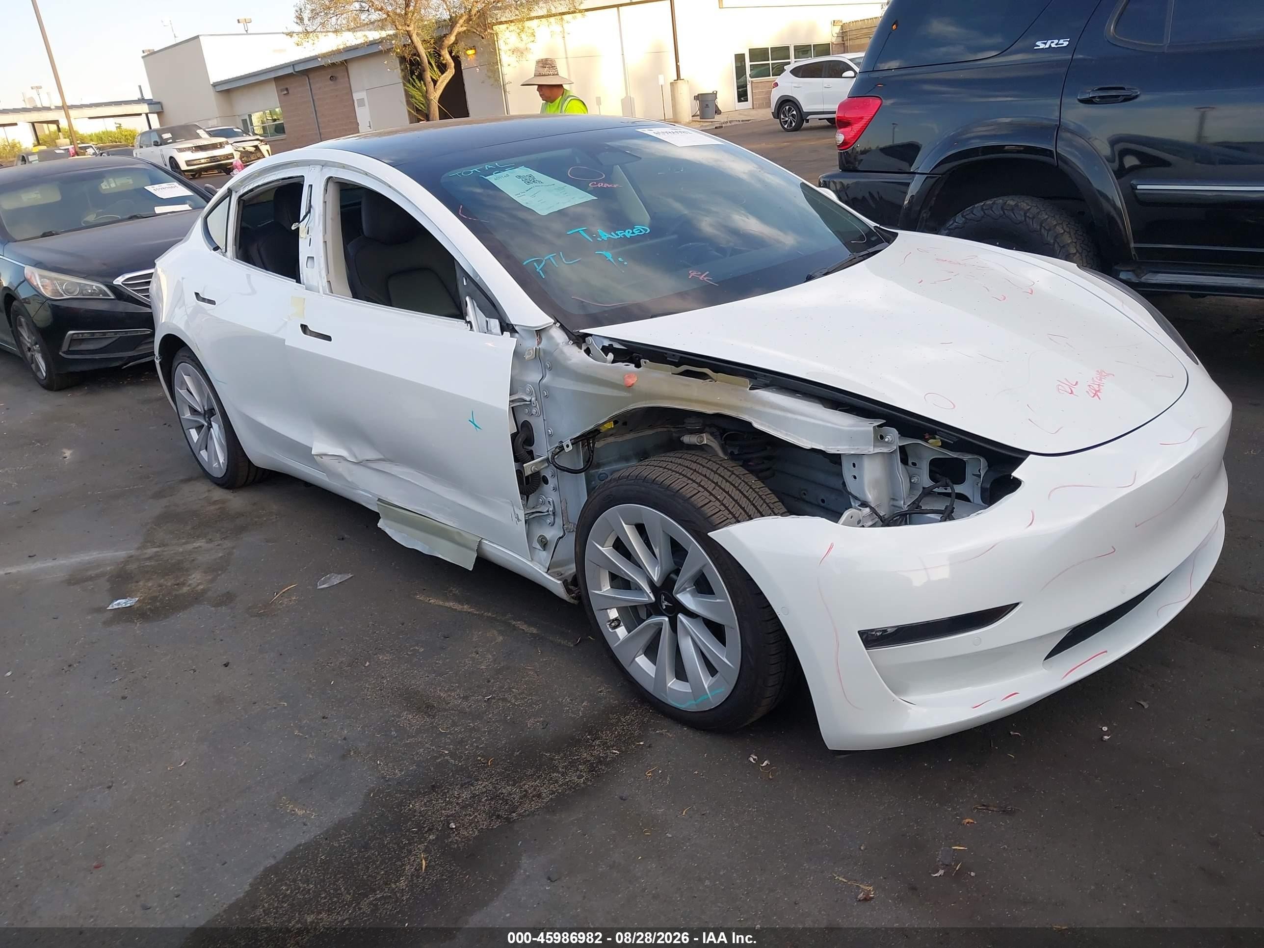 2022 Tesla Model 3 VIN 5YJ3E1EB2NF297375 — IAAI salvage auction photo