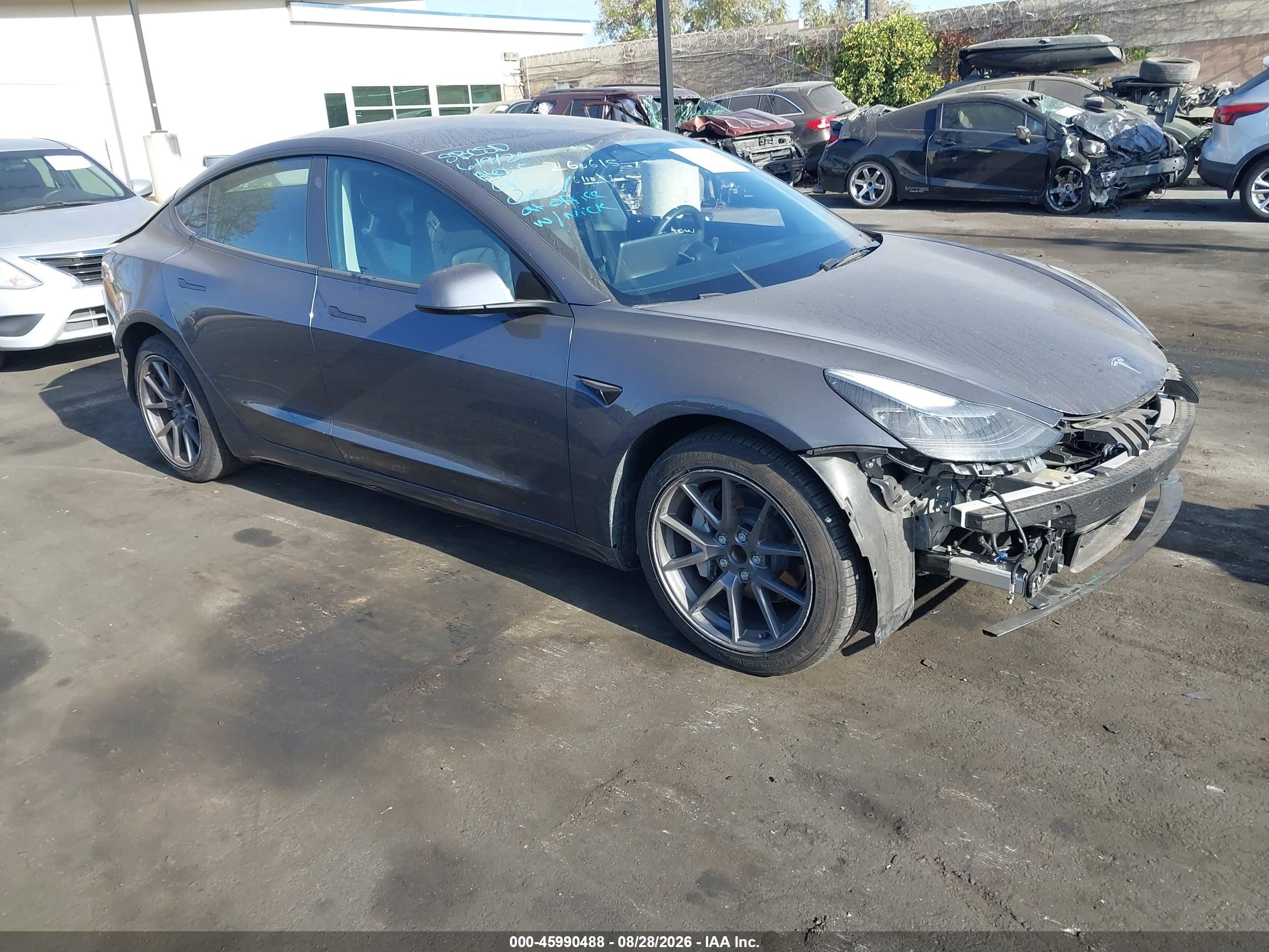 2023 Tesla Model 3 VIN 5YJ3E1EA1PF616436 IAAI salvage auction — Front & Rear, Salvage Certificate (California), sold $8,900 on 2026-10-02 (photo 1)