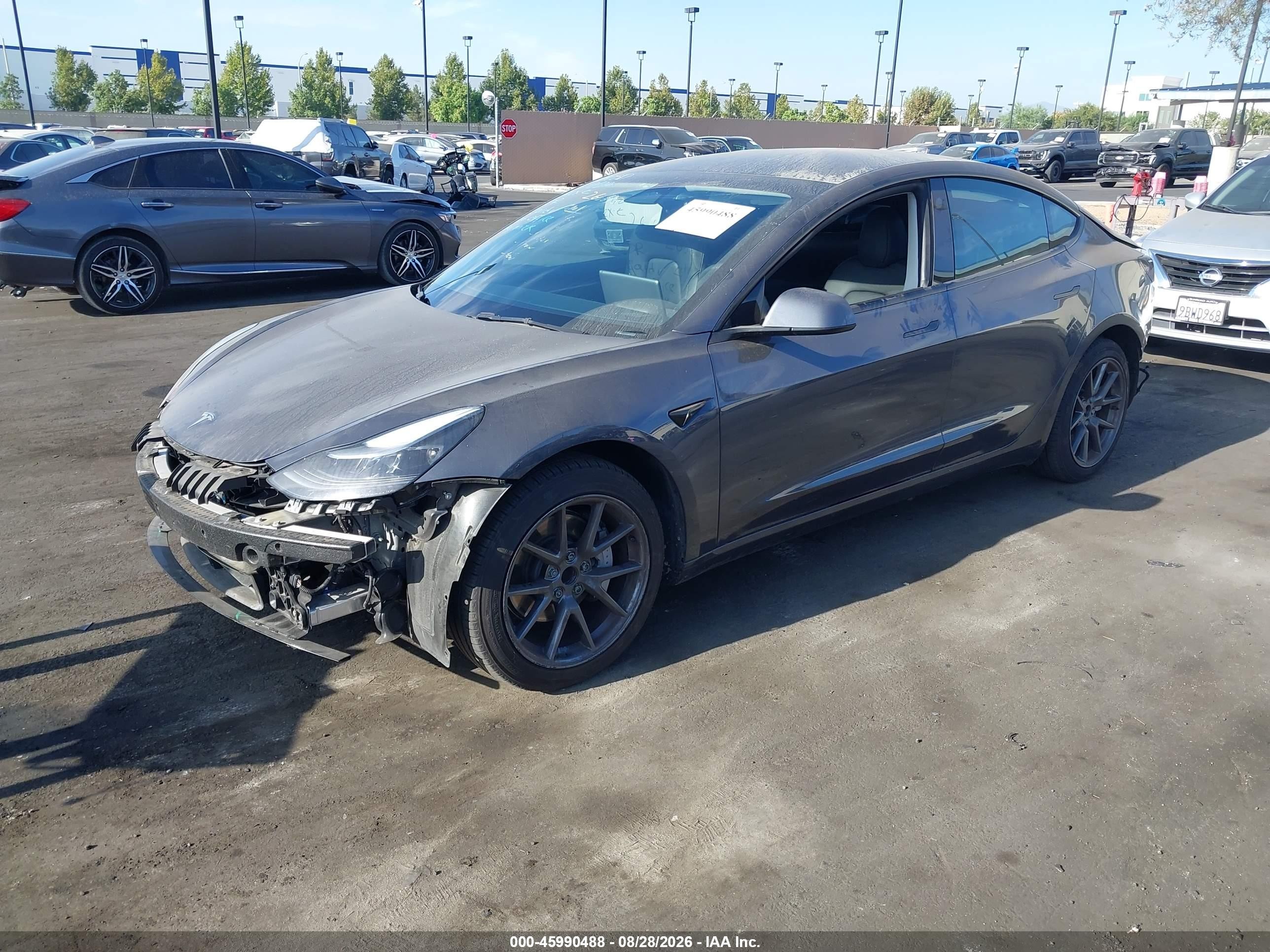 2023 Tesla Model 3 VIN 5YJ3E1EA1PF616436 IAAI salvage auction — Front & Rear, Salvage Certificate (California), sold $8,900 on 2026-10-02 (photo 2)