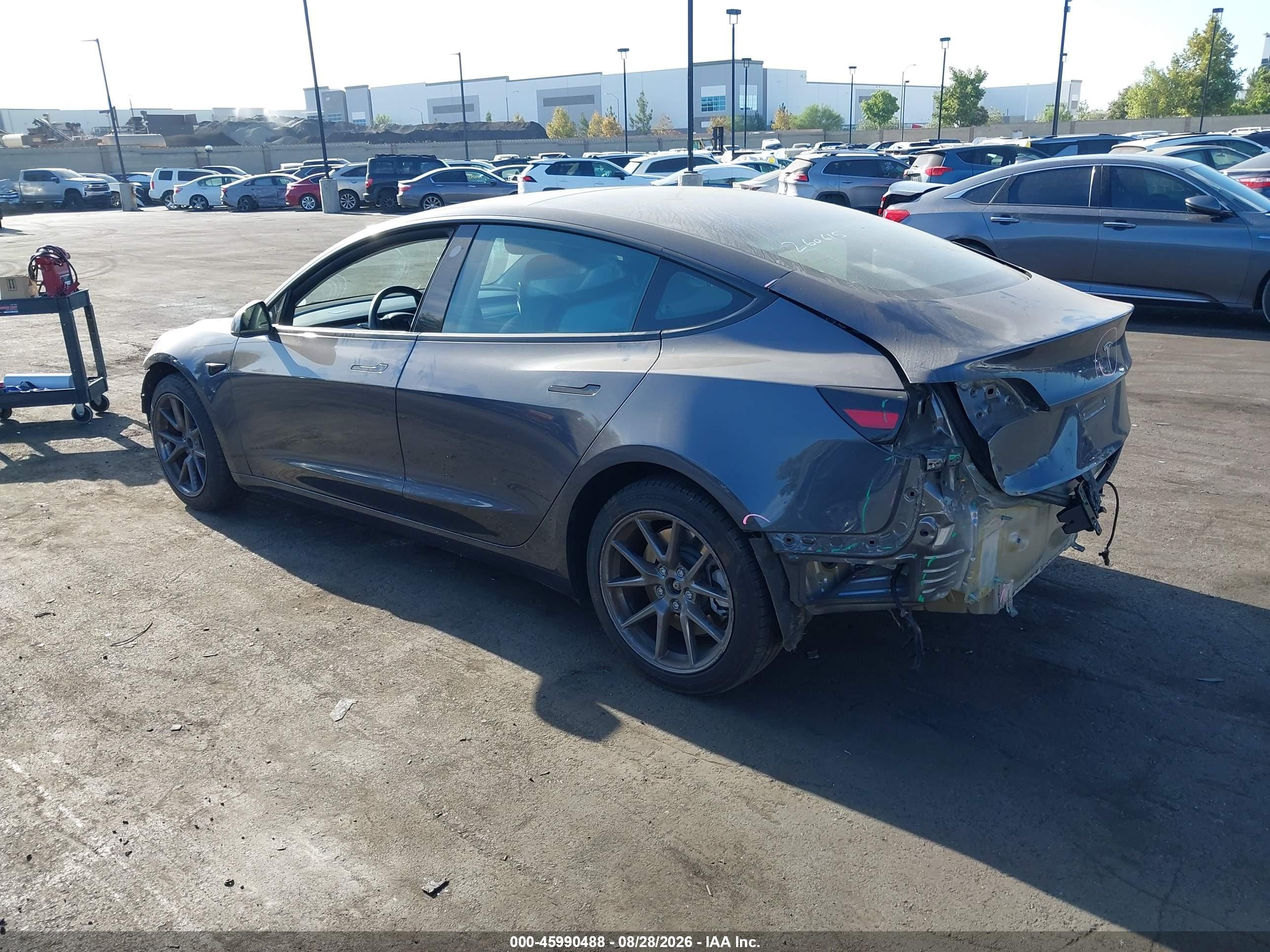 2023 Tesla Model 3 VIN 5YJ3E1EA1PF616436 IAAI salvage auction — Front & Rear, Salvage Certificate (California), sold $8,900 on 2026-10-02 (photo 3)