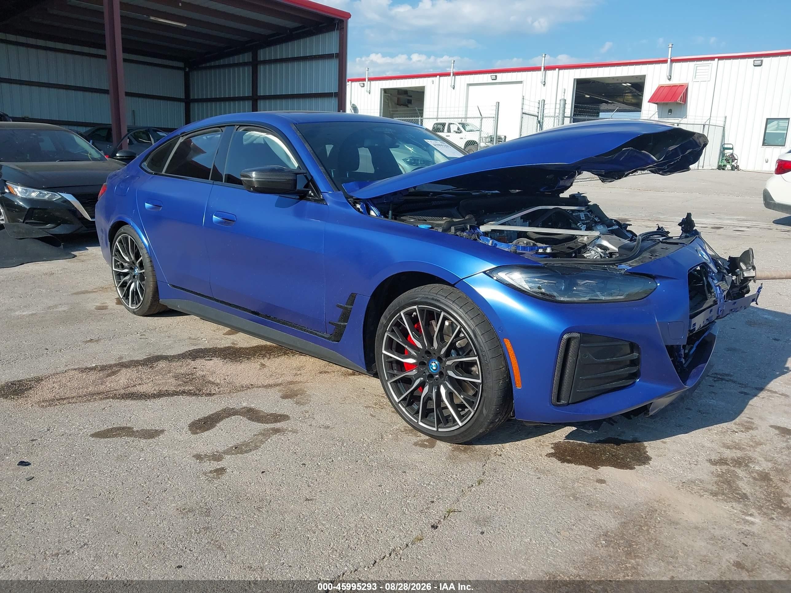 2023 BMW i4 VIN WBY33AW05PFP73067 — IAAI salvage auction photo