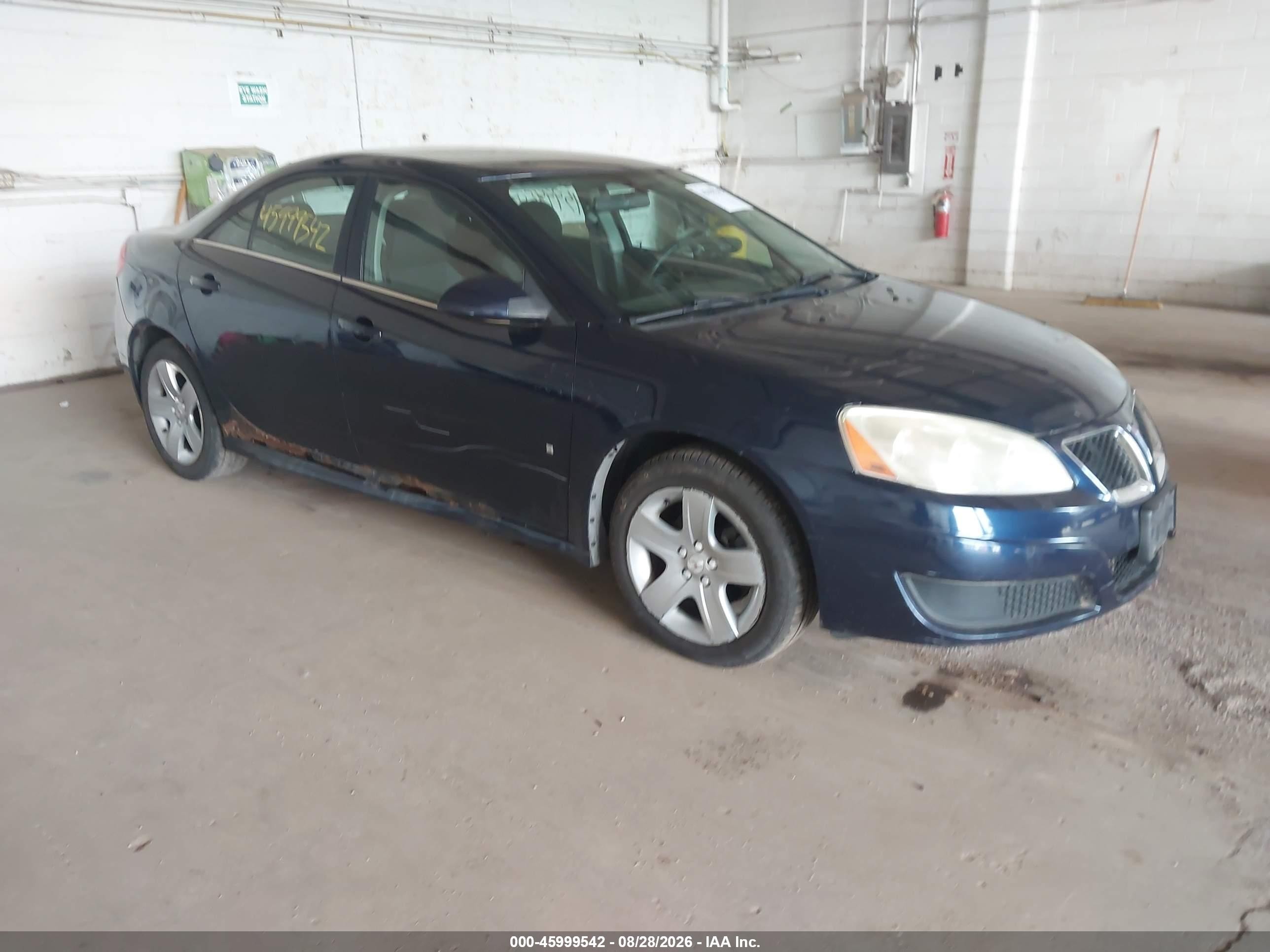 2010 Pontiac G6 VIN 1G2ZA5E02A4105082 IAAI salvage auction — Side, Clear (Wisconsin), sold $600 on 2026-09-18 (photo 1)