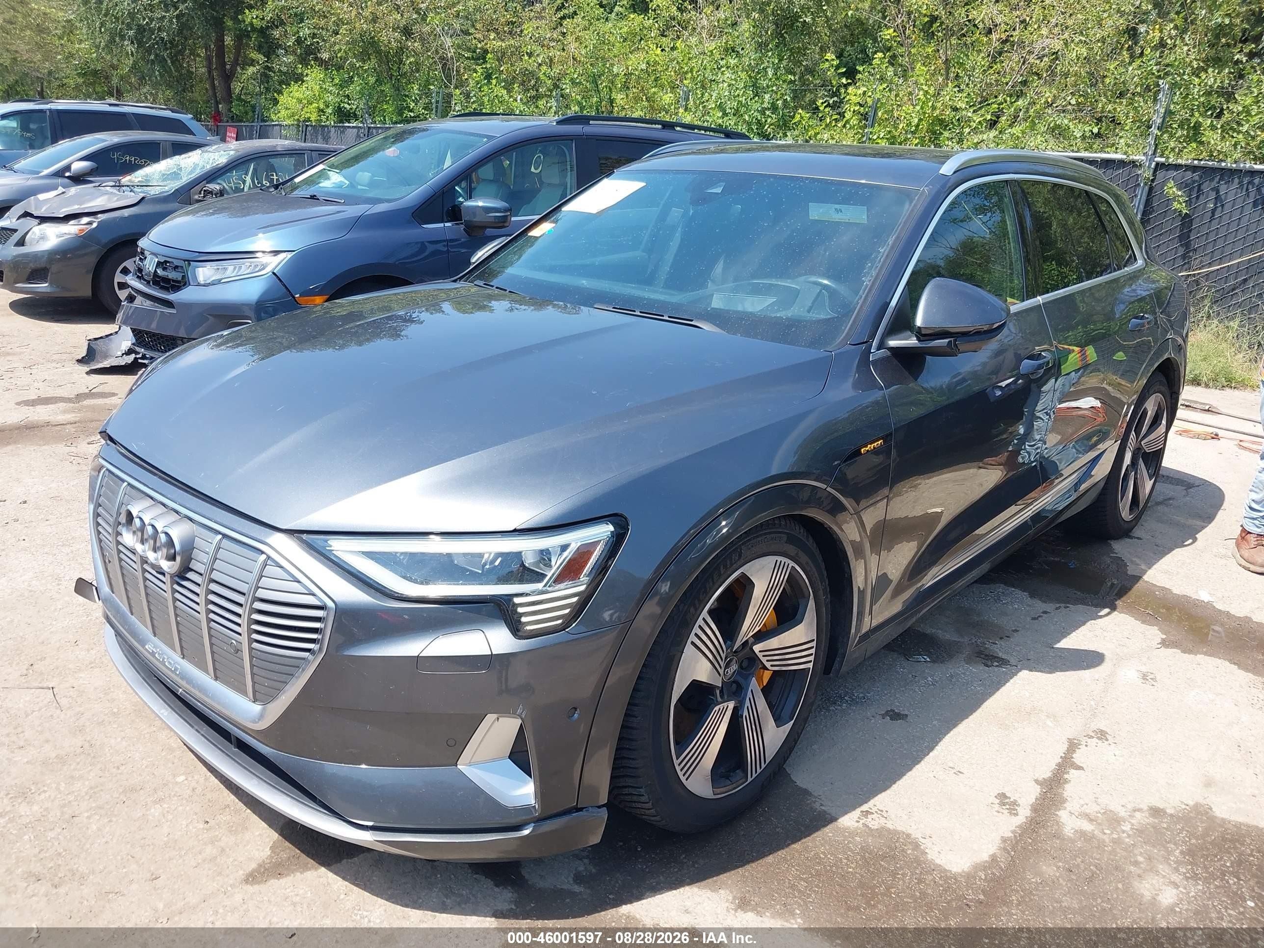 2019 Audi E-tron VIN WA1VAAGE3KB006208 IAAI salvage auction — Side, Salvage (Missouri), sold $13,400 on 2026-10-01 (photo 2)