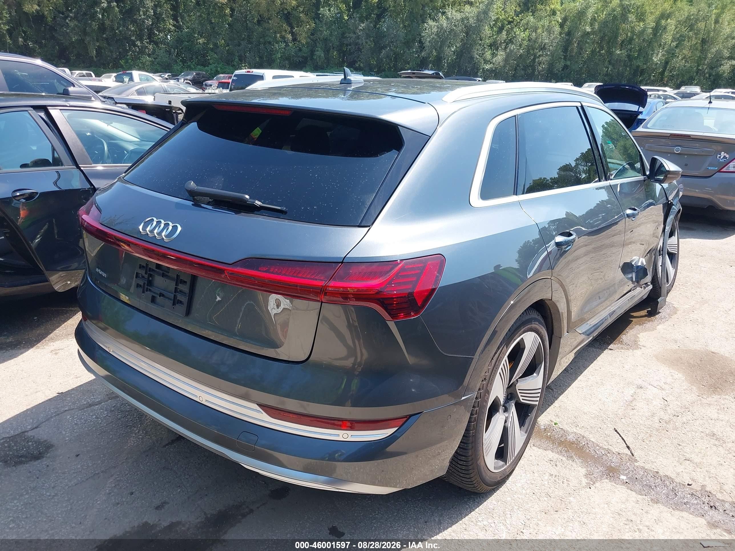 2019 Audi E-tron VIN WA1VAAGE3KB006208 IAAI salvage auction — Side, Salvage (Missouri), sold $13,400 on 2026-10-01 (photo 4)