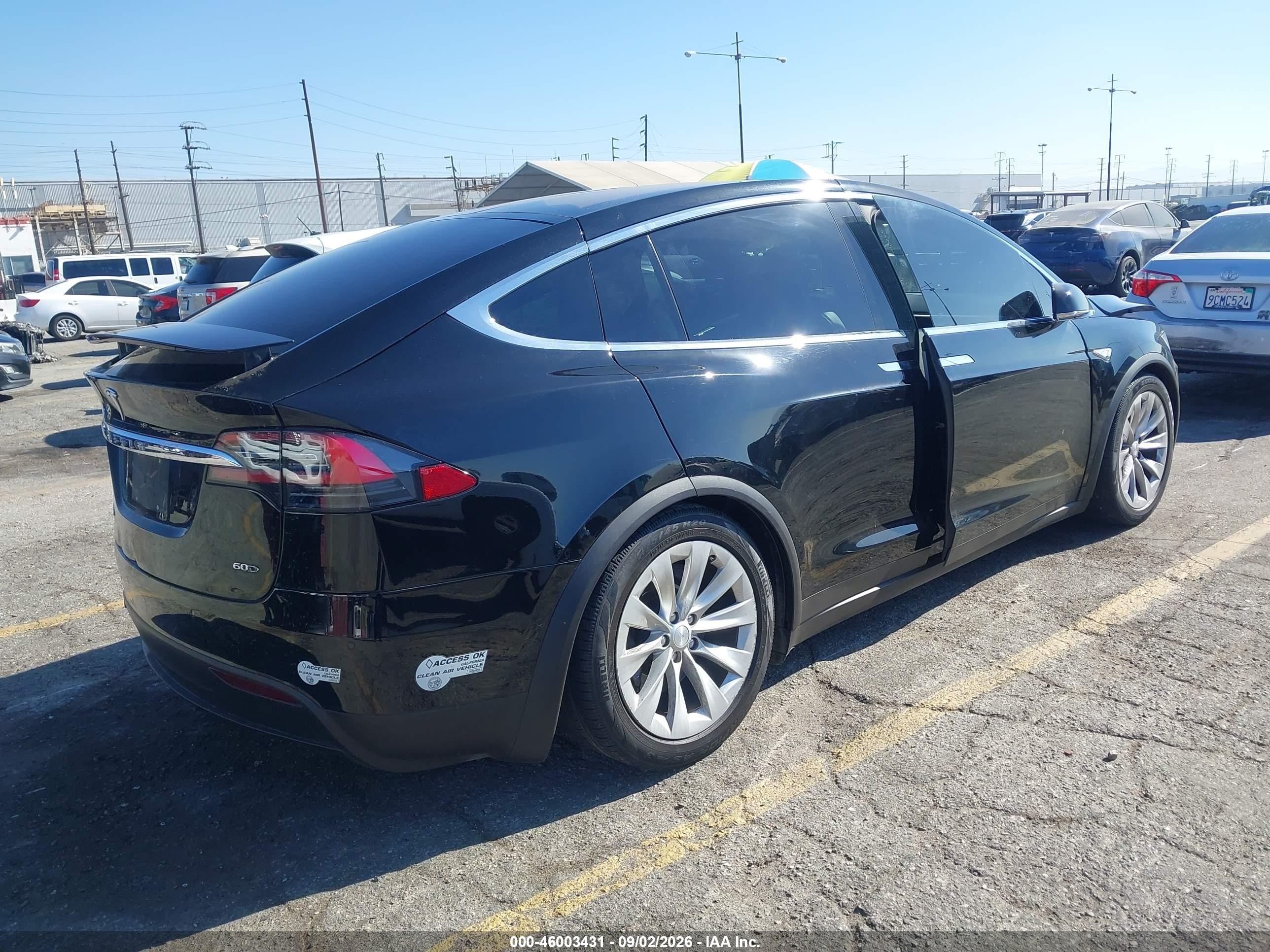 2016 Tesla Model x VIN 5YJXCBE24GF016421 IAAI salvage auction — Rear End, Salvage (California), sold $6,275 on 2026-10-09 (photo 4)