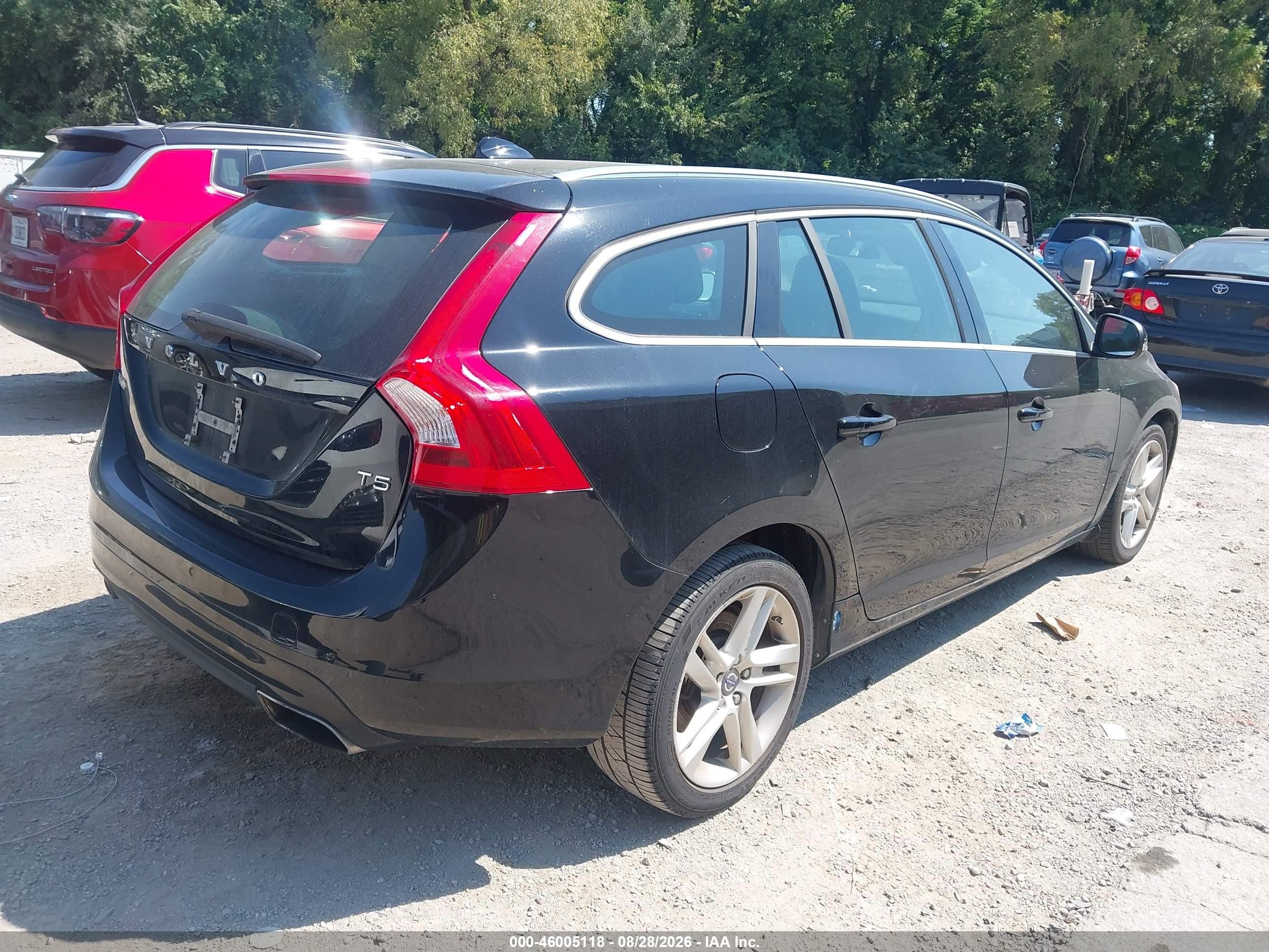 2015 Volvo V60 VIN YV140MEB7F1207680 IAAI salvage auction — Normal Wear, Clear (Missouri), sold $1,800 on 2026-09-18 (photo 4)