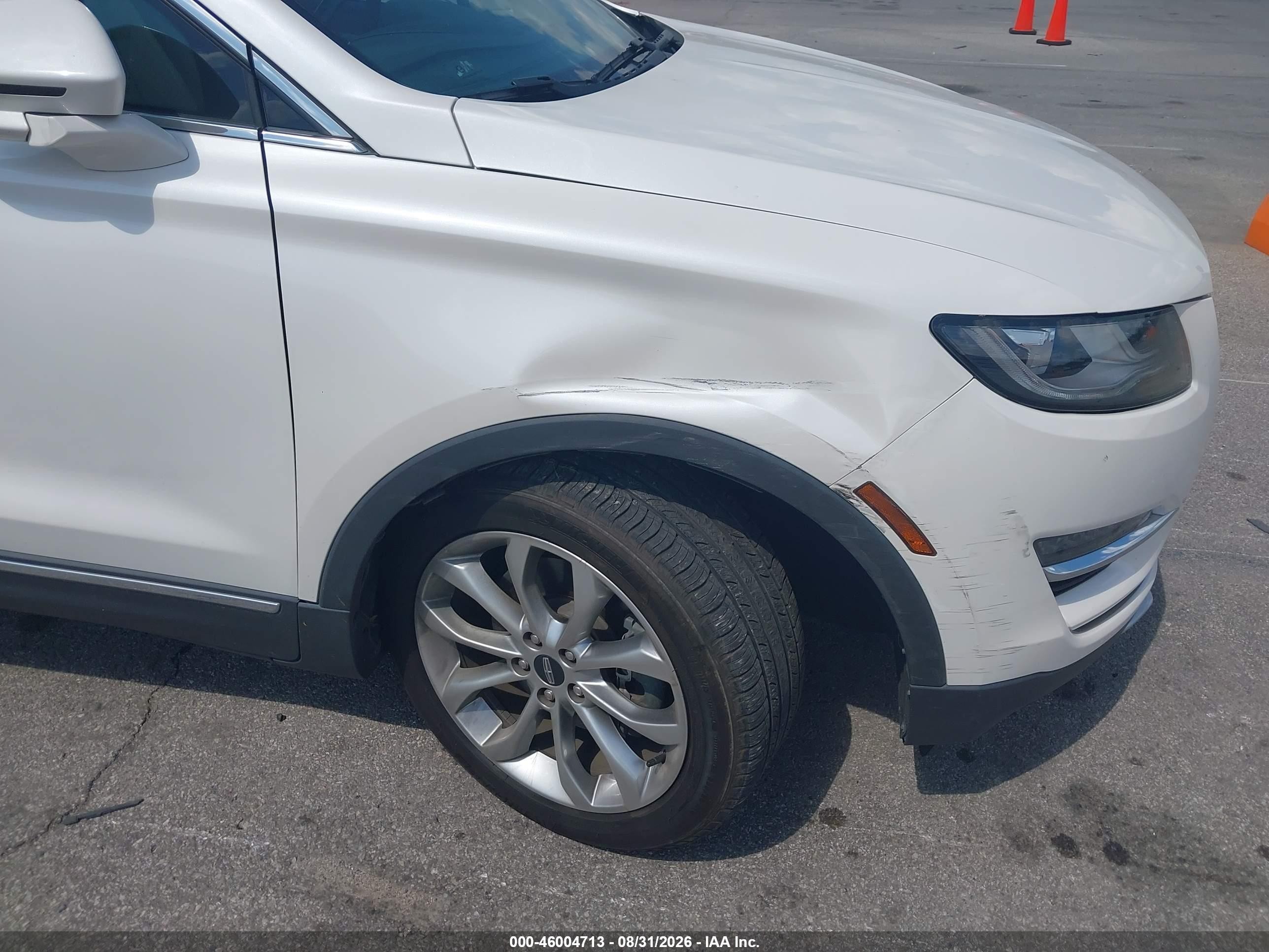 2019 Lincoln Mkc VIN 5LMCJ2C95KUL30155 IAAI salvage auction — Side, Salvage (Indiana), sold $5,700 on 2026-09-26 (photo 6)